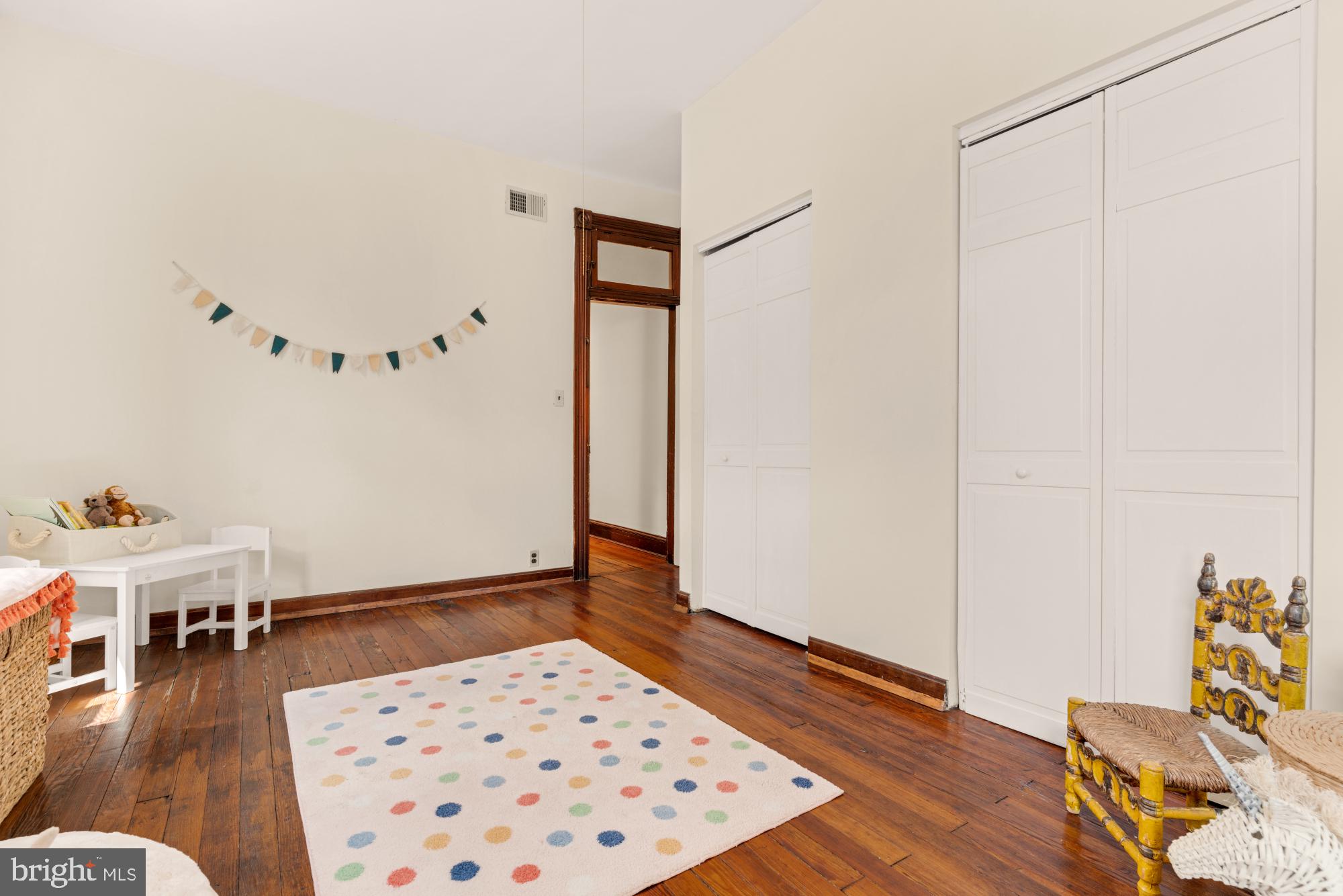 2133 Bolton Street Baltimore, MD 21217 - Photo 29 of 53 a living room with furniture and a wooden floor