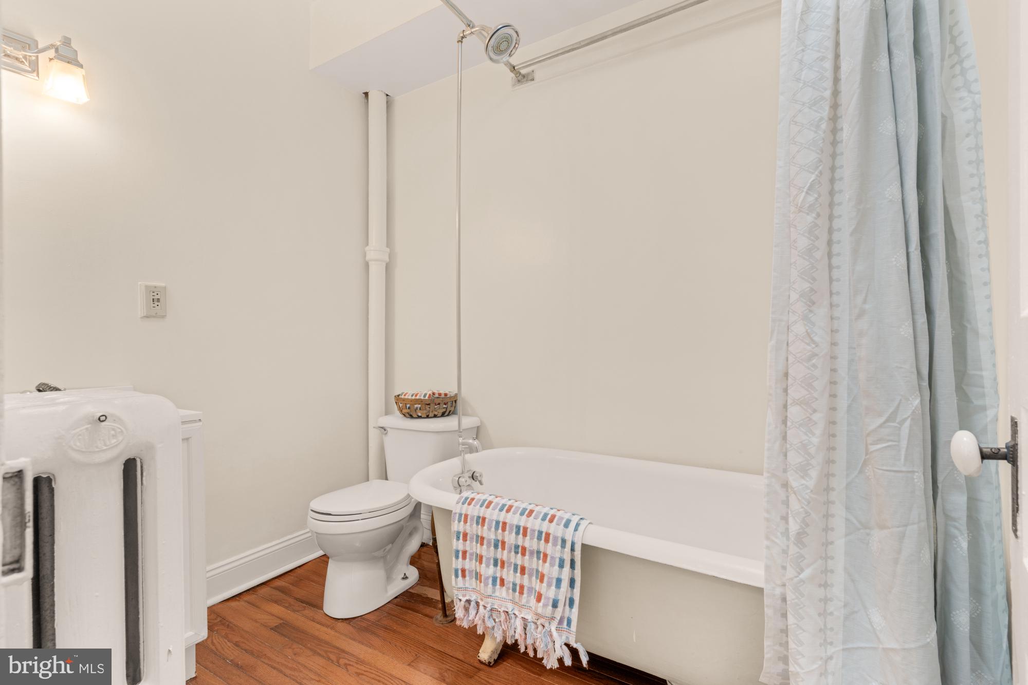 2133 Bolton Street Baltimore, MD 21217 - Photo 34 of 53 a bathroom with a sink toilet and shower