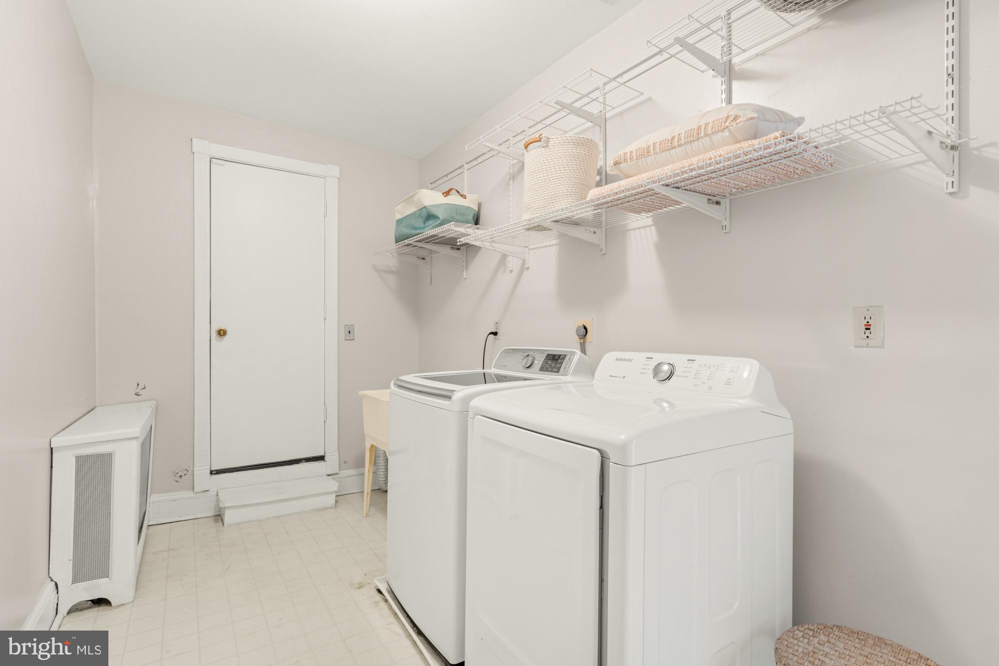 2133 Bolton Street Baltimore, MD 21217 - Photo 35 of 53 a utility room with dryer and washer