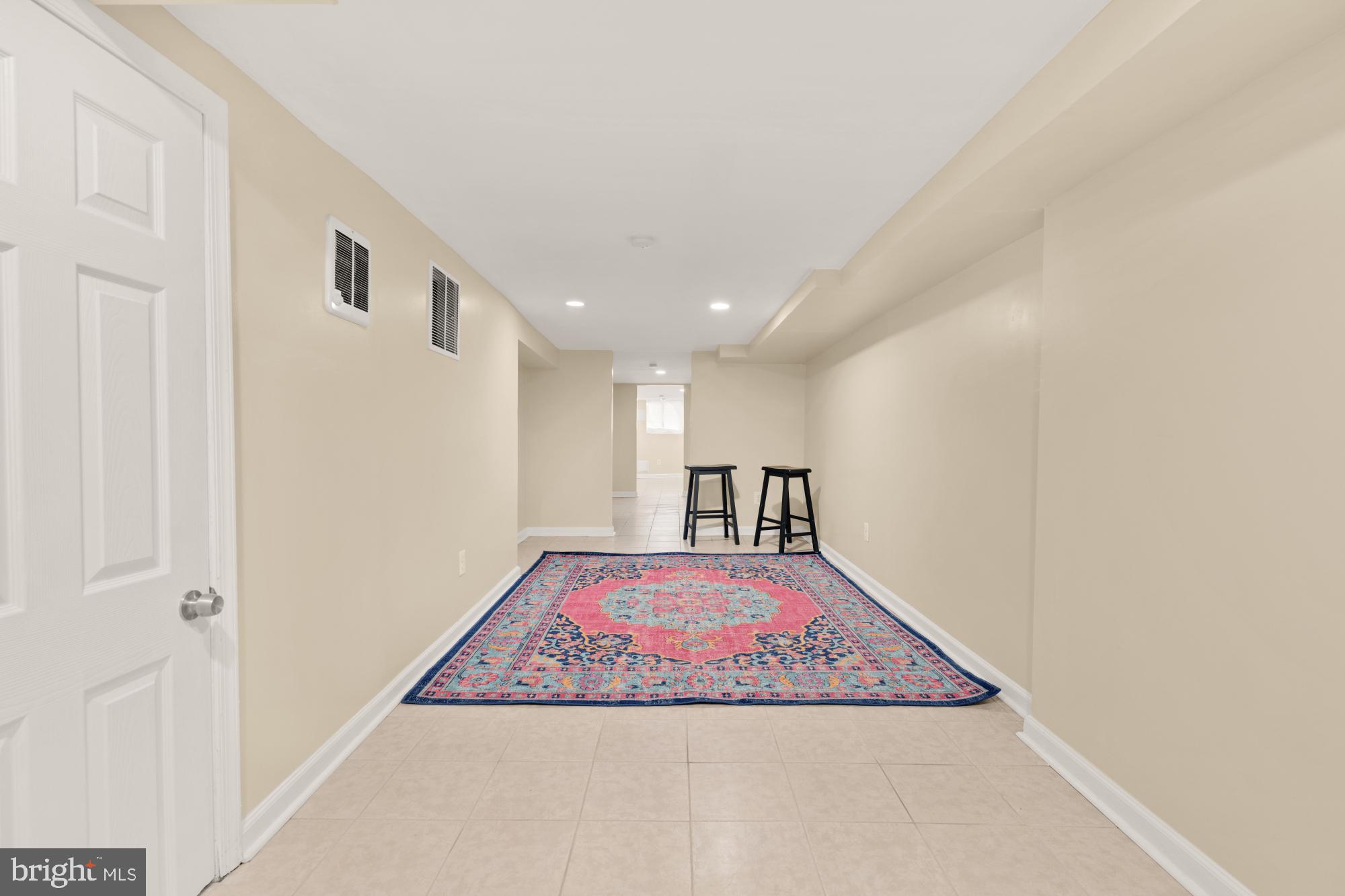 2133 Bolton Street Baltimore, MD 21217 - Photo 39 of 53 a view of a hallway with a kitchen
