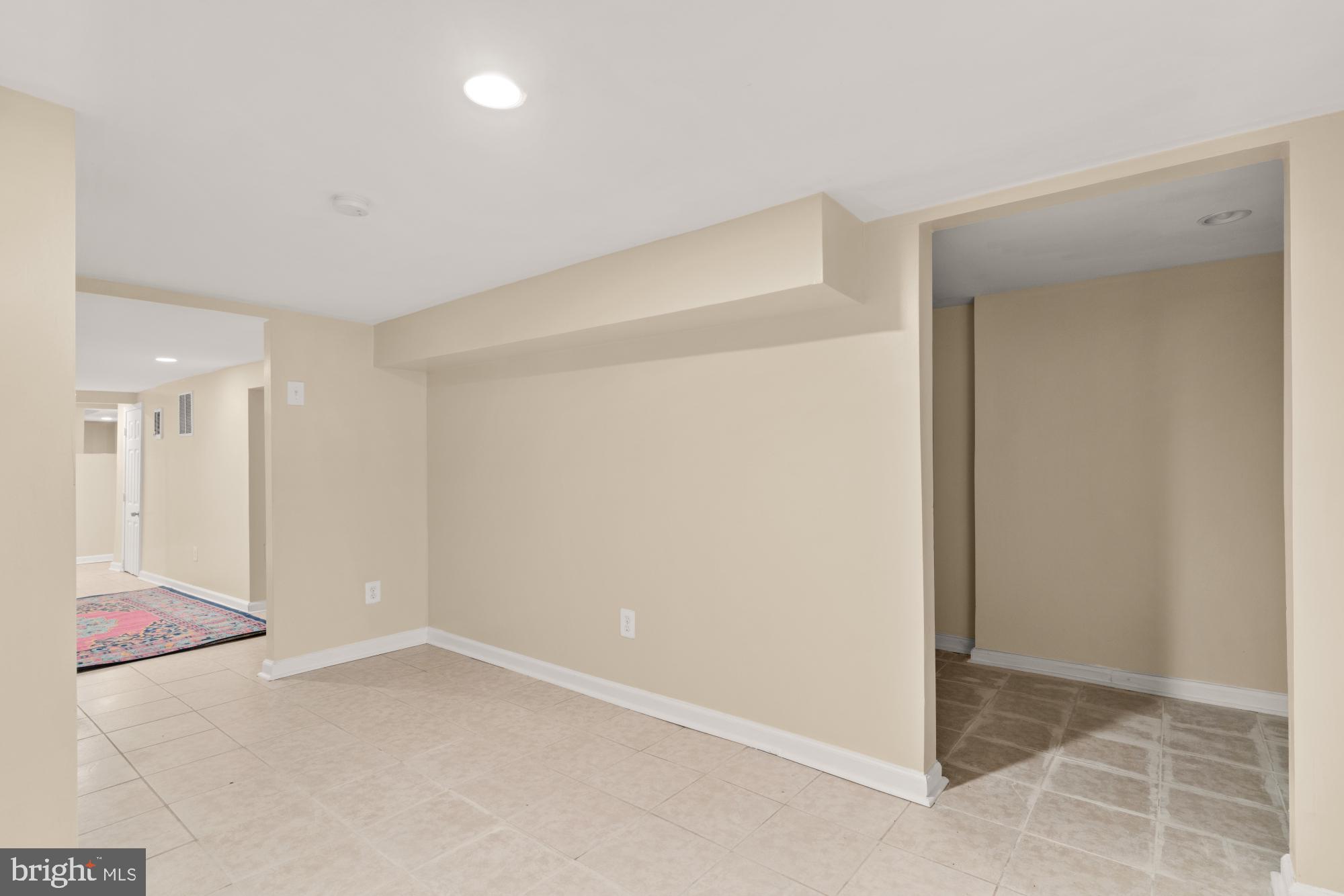 2133 Bolton Street Baltimore, MD 21217 - Photo 40 of 53 an empty room with wooden floor and windows