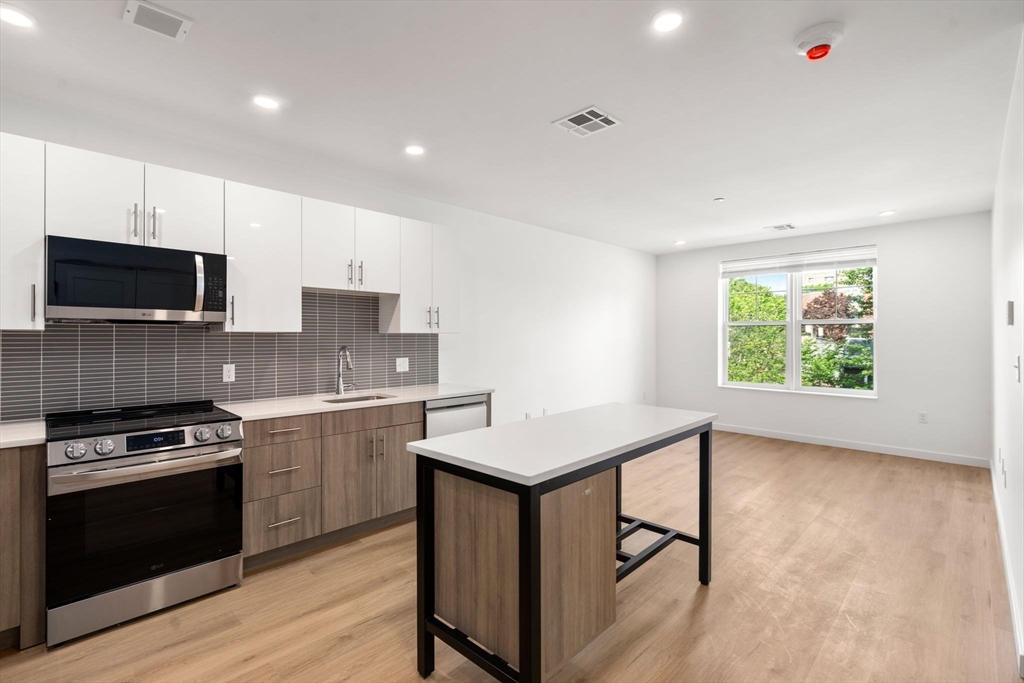 40 Centre Street, Unit 408 Brookline, MA 02446 - Photo 2 of 9