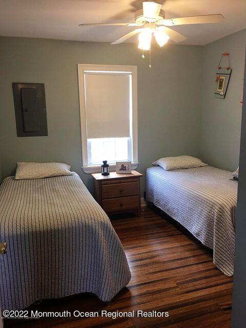 111 Guyer Avenue, Unit DOWN Lavallette, NJ 08735 - Photo 17 of 21 a bedroom with a bed and a window