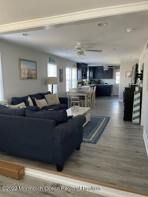 111 Guyer Avenue, Unit DOWN Lavallette, NJ 08735 - Photo 2 of 21 a living room with furniture and a wooden floor