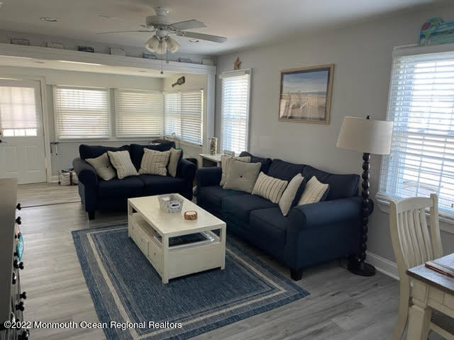111 Guyer Avenue, Unit DOWN Lavallette, NJ 08735 - Photo 4 of 21 a living room with furniture and a window