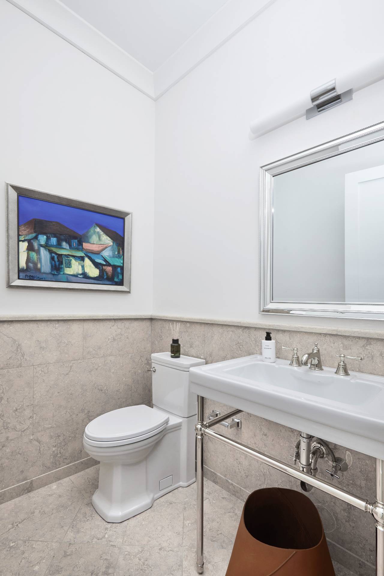 495 Scuttle Hole Road Water Mill, NY 11976 - Photo 10 of 29 a bathroom with a toilet a sink and mirror