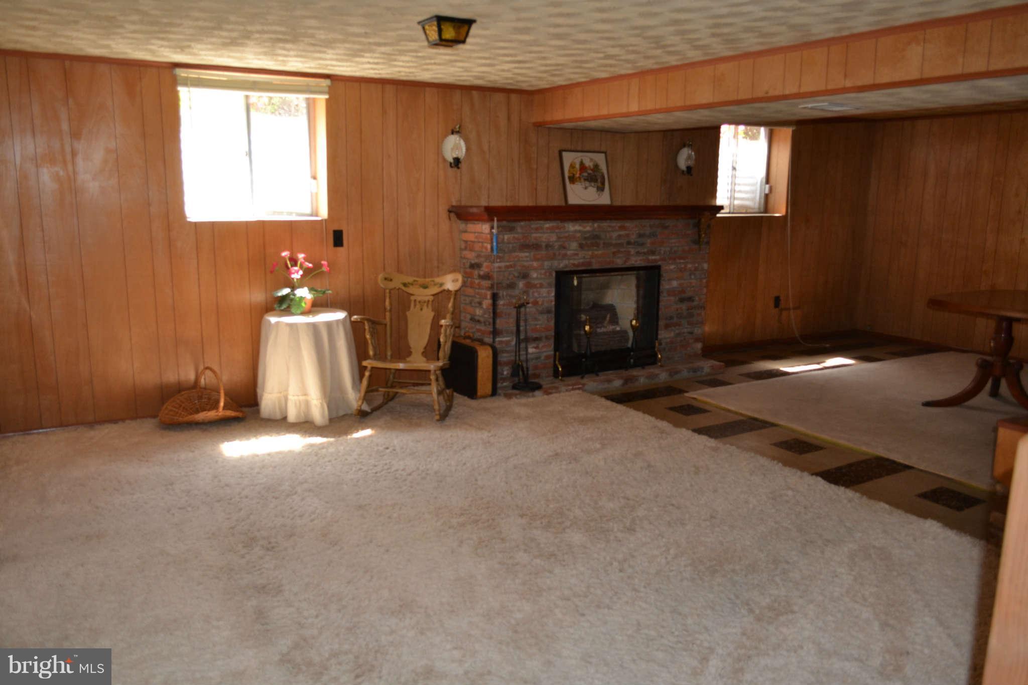 1406 Woodbridge Road Baltimore, MD 21228 - Photo 13 of 18 a view of empty room with a fireplace