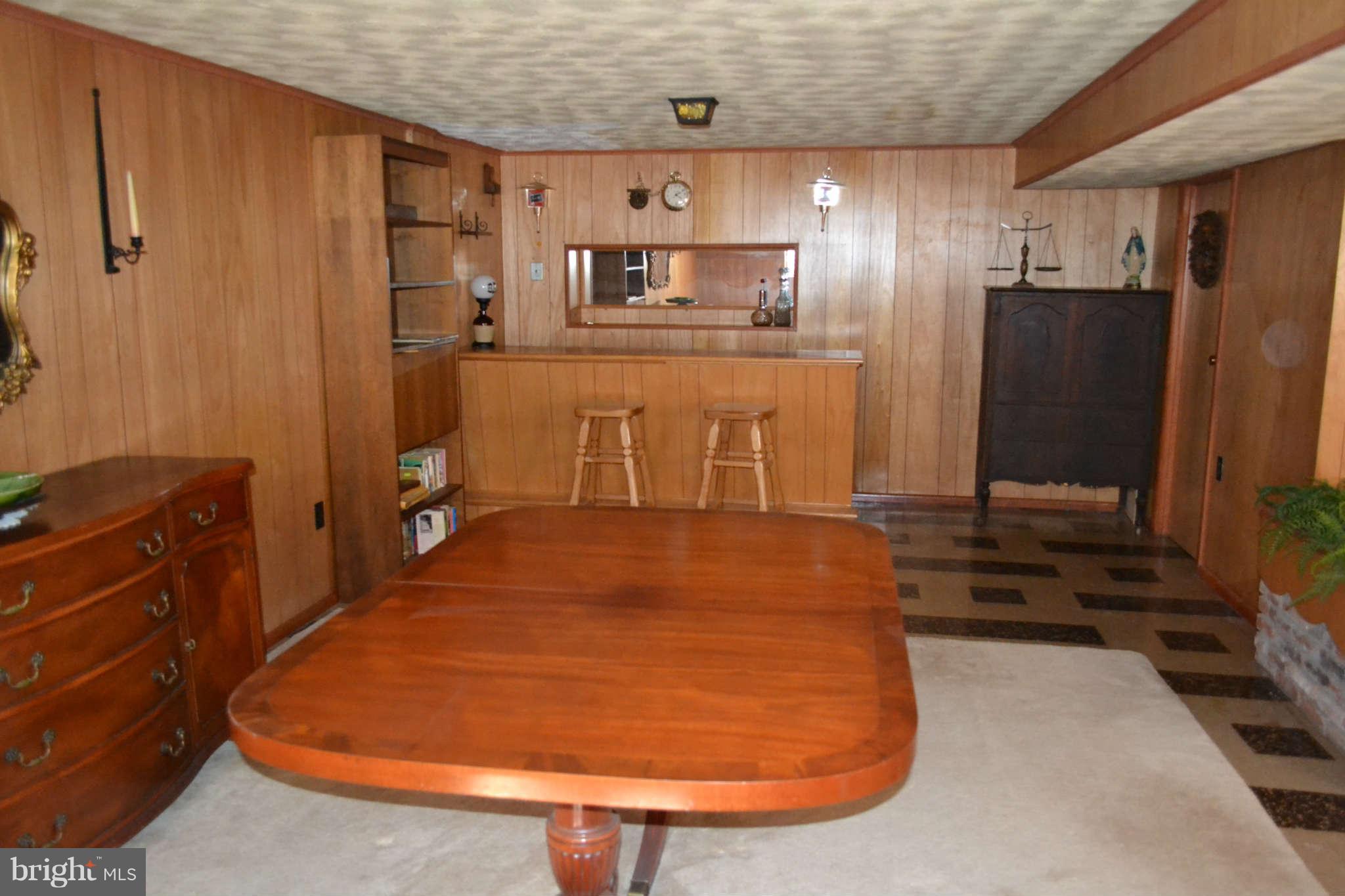 1406 Woodbridge Road Baltimore, MD 21228 - Photo 14 of 18 a room with wooden cabinets