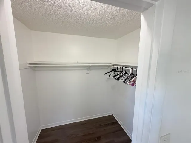 a view of a room with racks on the wall