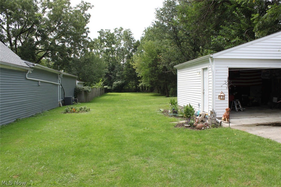 3748 Cress Road Cleveland, OH 44111 - Photo 10 of 14 Expansive grassy yard with mature trees and newer 2 Car Garage.
