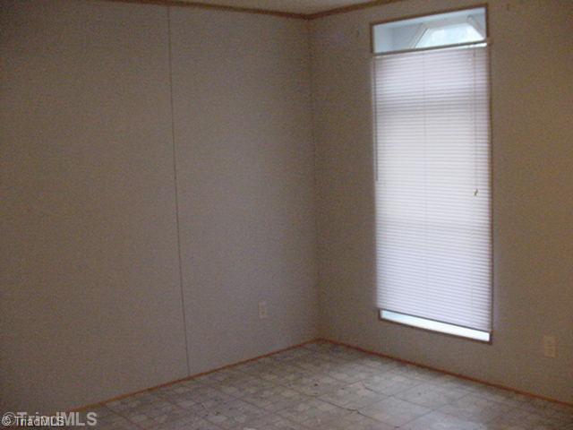 7736 Grapevine Road Lewisville, NC 27023 - Photo 10 of 13 2nd Bedroom.