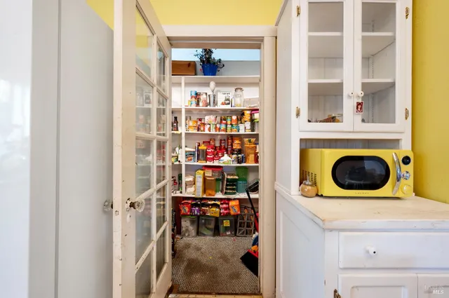 a view of living room with washer and dryer