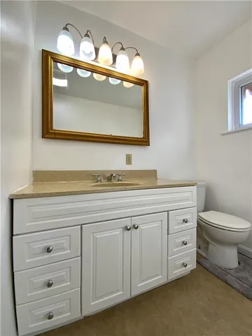 a bathroom with a sink and a toilet