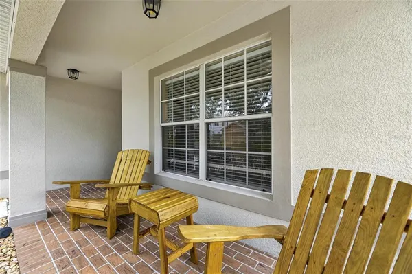 a view of a lounge chair in the balcony