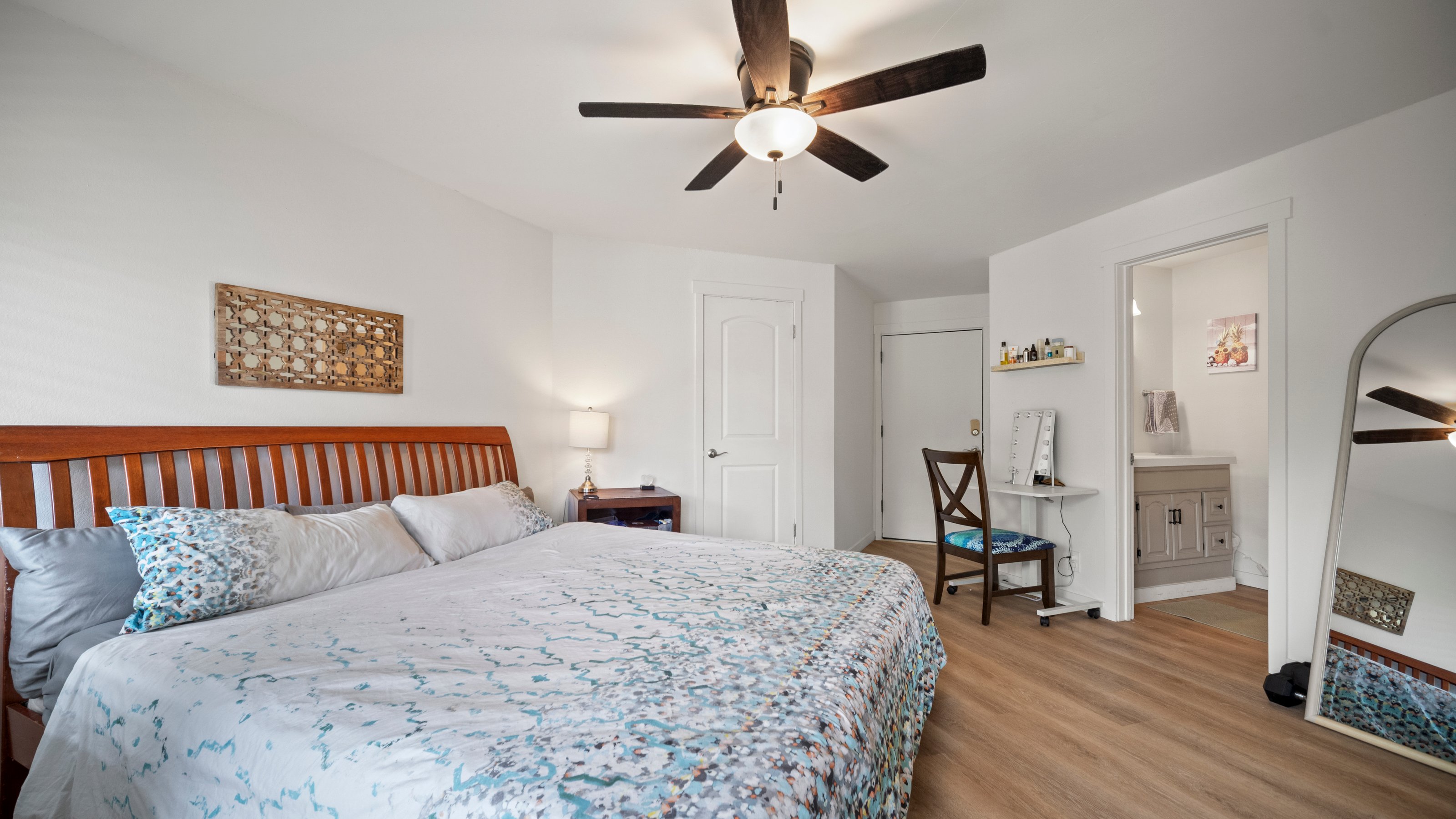 4121 Rice Street, Unit 2708 Lihue, HI 96766 - Photo 14 of 29 a bedroom with a large bed and a tv