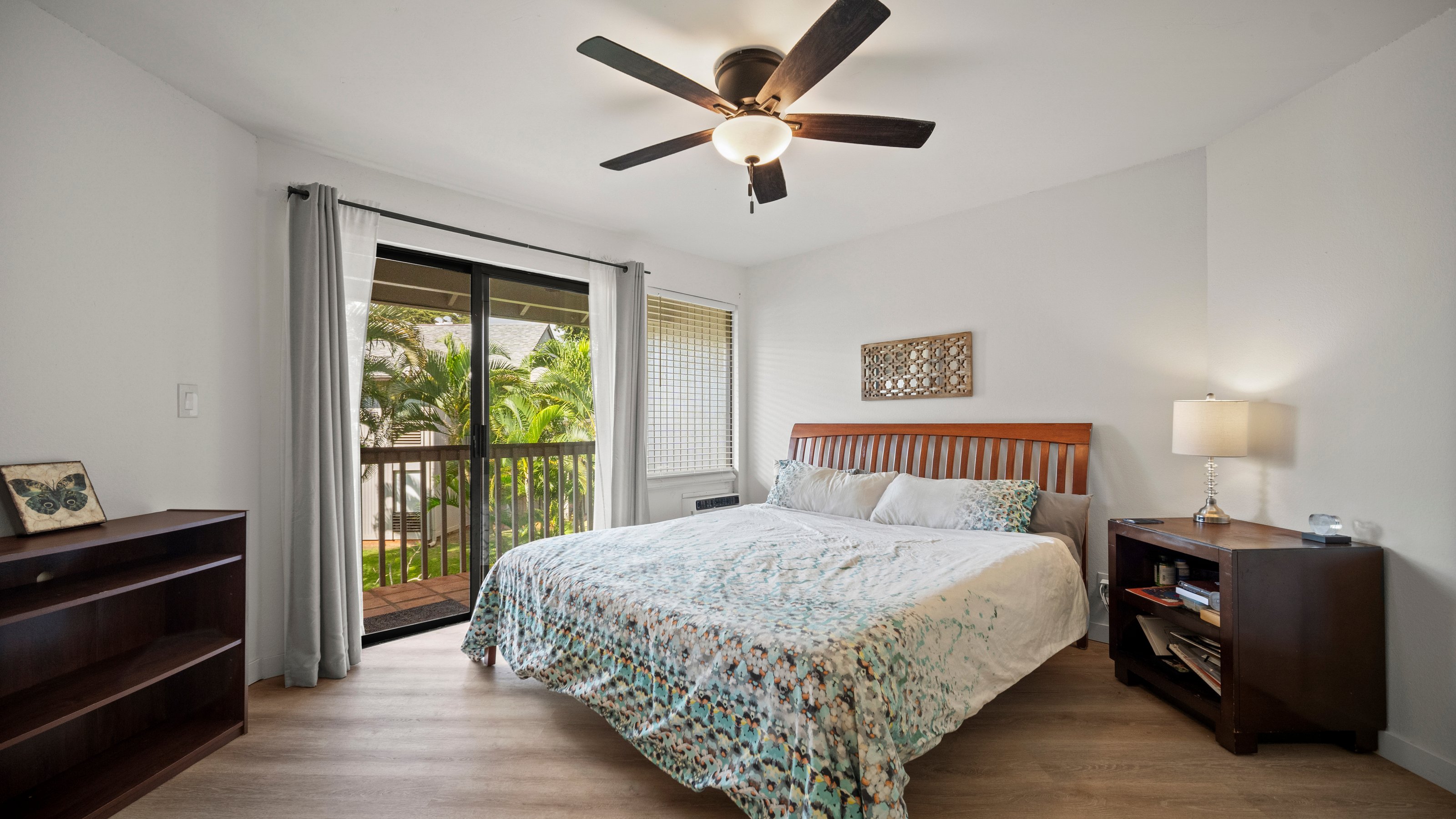 4121 Rice Street, Unit 2708 Lihue, HI 96766 - Photo 15 of 29 a bedroom with a bed and a window