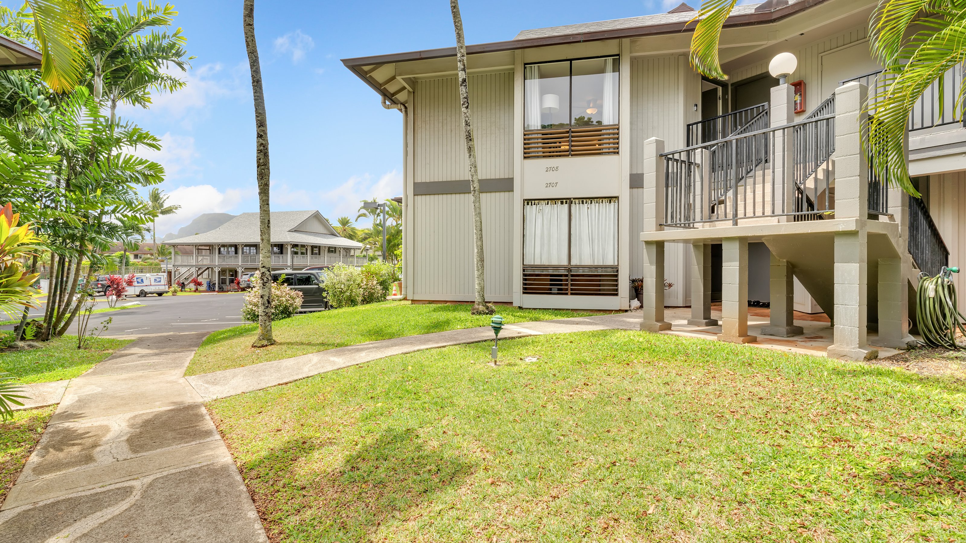 4121 Rice Street, Unit 2708 Lihue, HI 96766 - Photo 22 of 29 a view of a house with swimming pool and sitting area