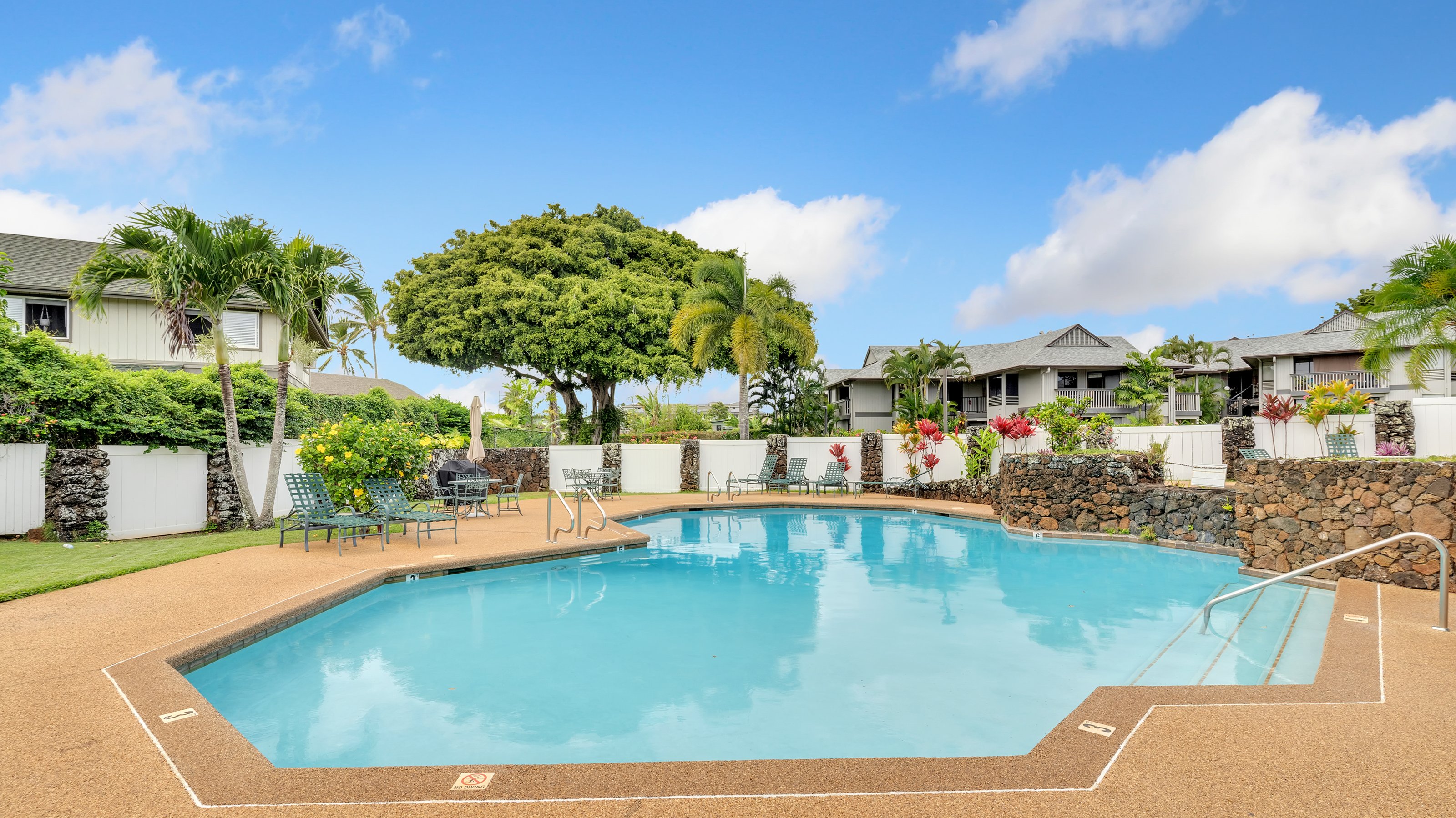 4121 Rice Street, Unit 2708 Lihue, HI 96766 - Photo 23 of 29 a view of a swimming pool with a patio