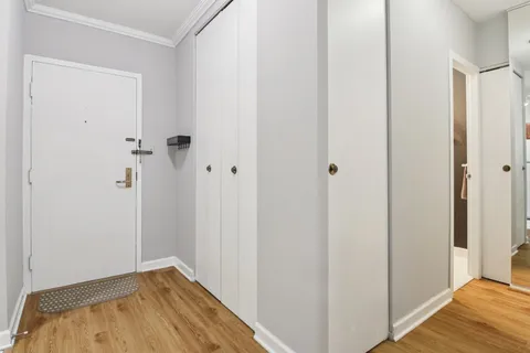 a view of small space with wooden floor