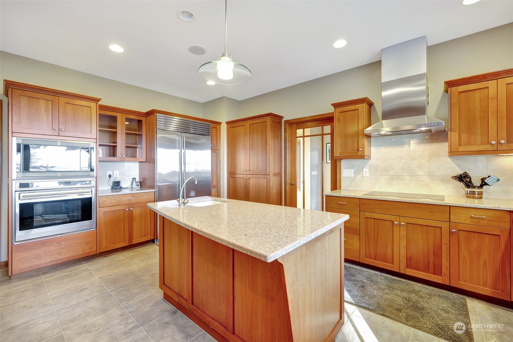 372 Owls Nest Road Sequim, WA 98382 - Photo 13 of 40 a large kitchen with stainless steel appliances granite countertop a sink and cabinets