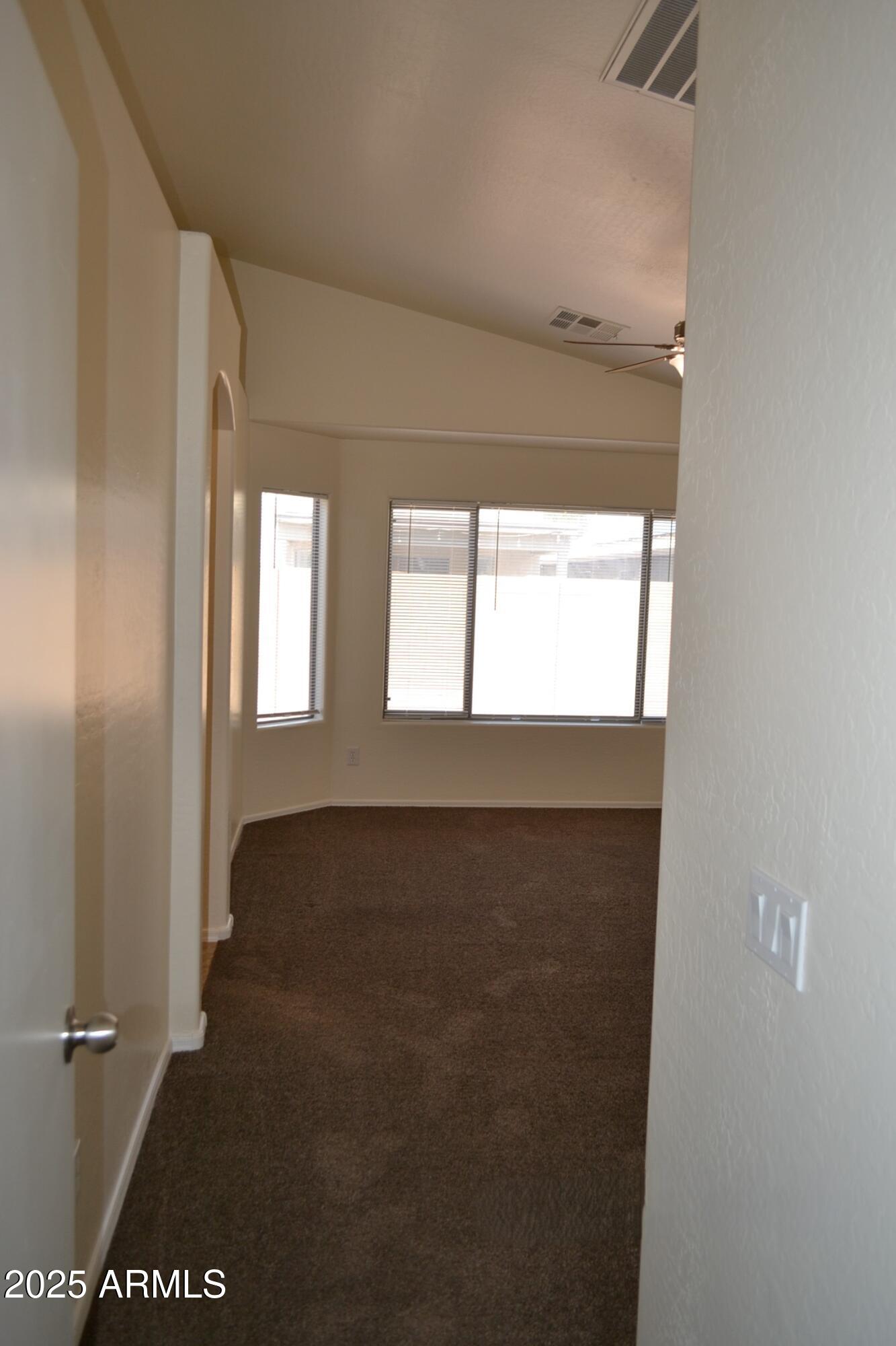 6746 East Superstition Way Florence, AZ 85132 - Photo 12 of 19 a view of an empty room with a window