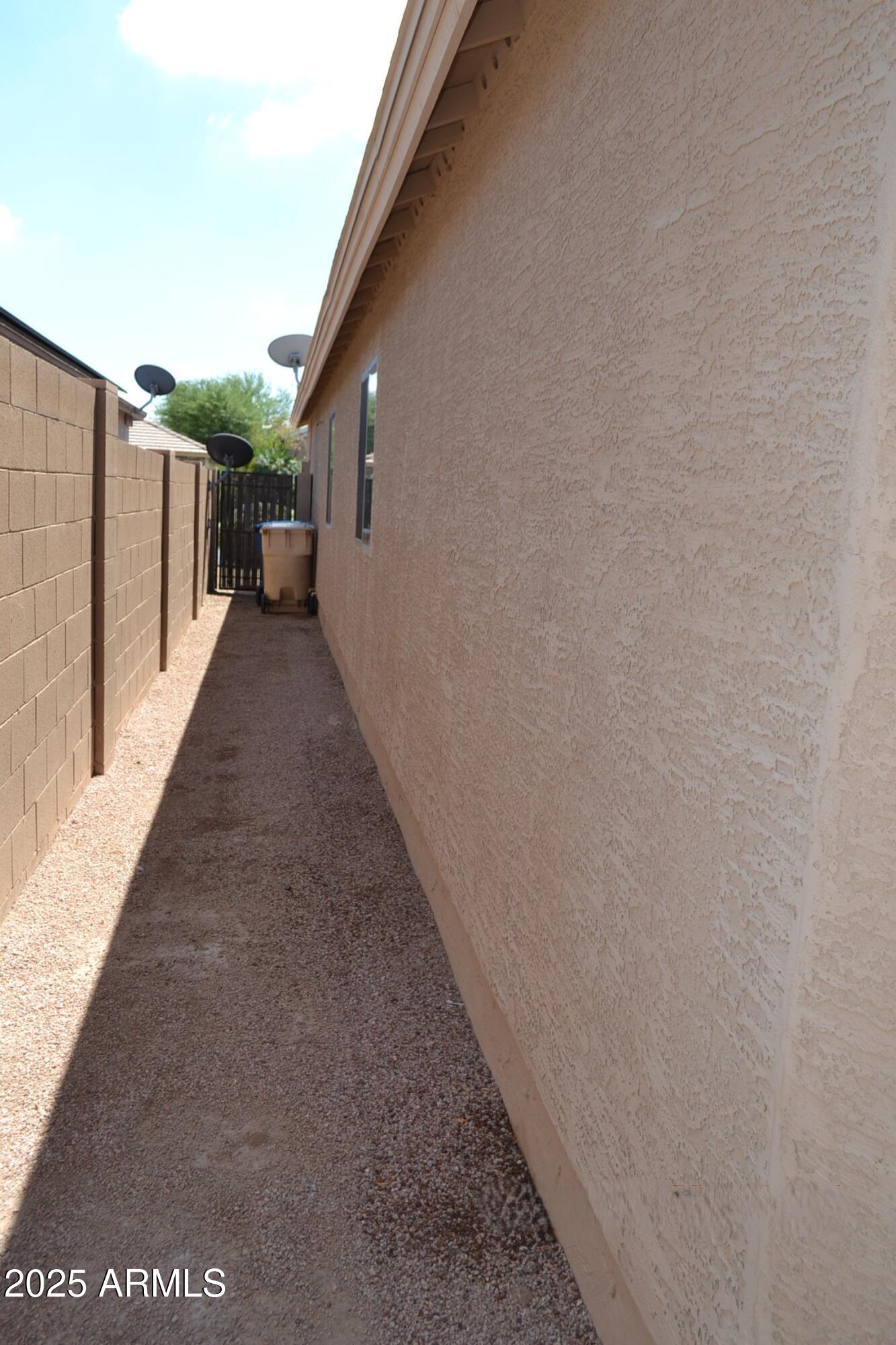 6746 East Superstition Way Florence, AZ 85132 - Photo 19 of 19 a view of a pathway with a building in the background