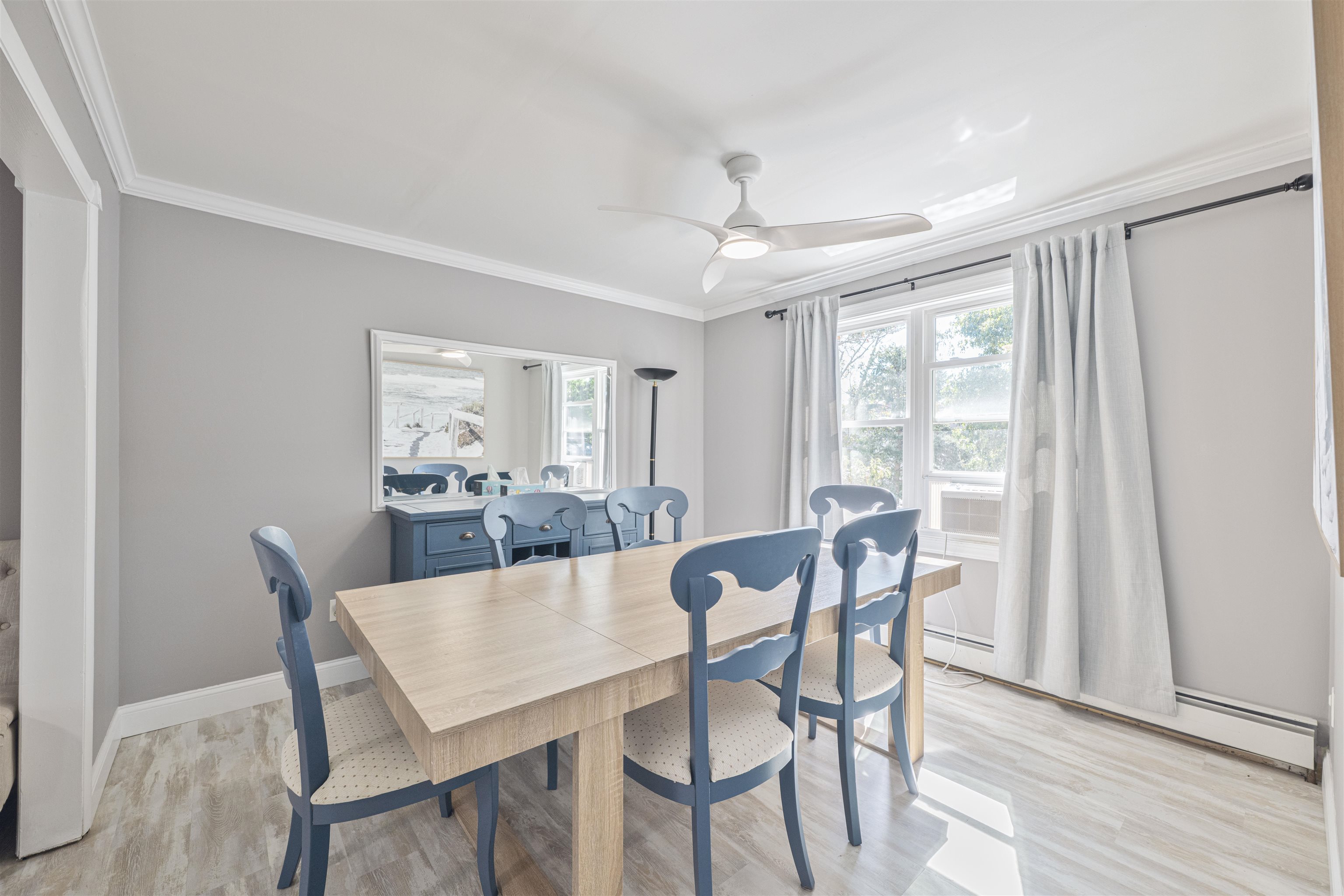 18 Pinewood Road Cape May, NJ 08204 - Photo 12 of 50 a view of a dining room with furniture window and wooden floor
