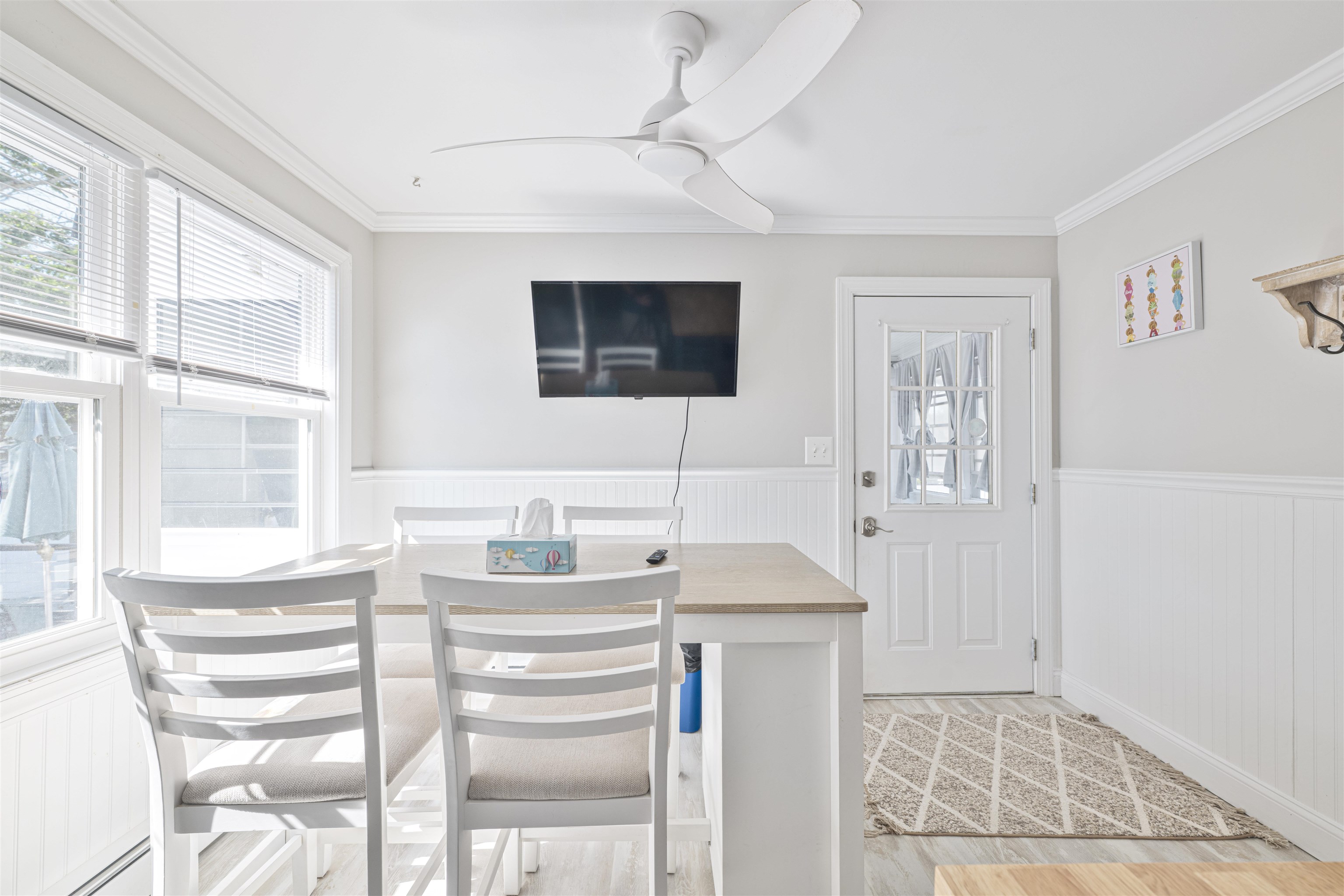 18 Pinewood Road Cape May, NJ 08204 - Photo 18 of 50 a bathroom with a sink a vanity and a mirror
