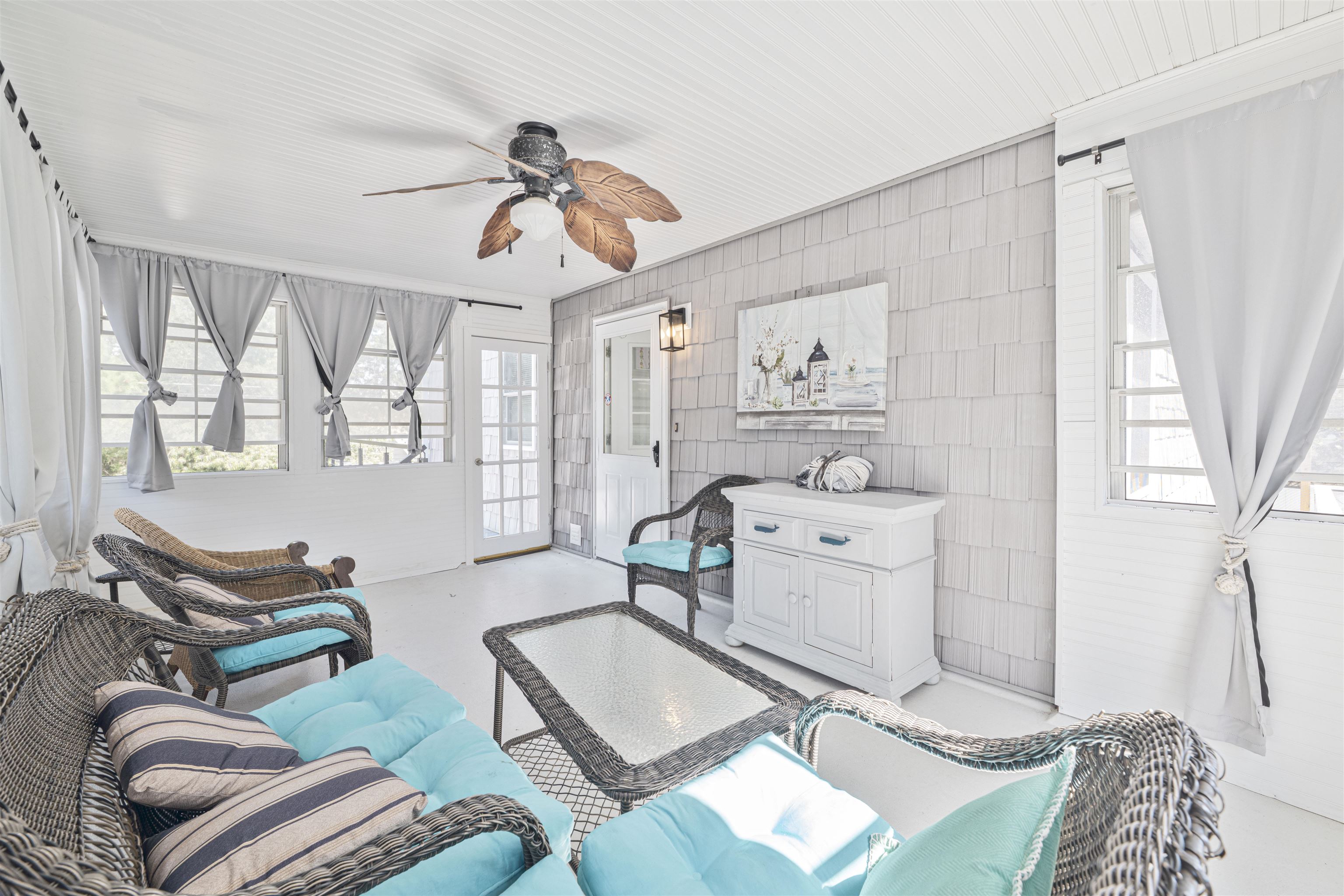 18 Pinewood Road Cape May, NJ 08204 - Photo 21 of 50 a living room with furniture and a window