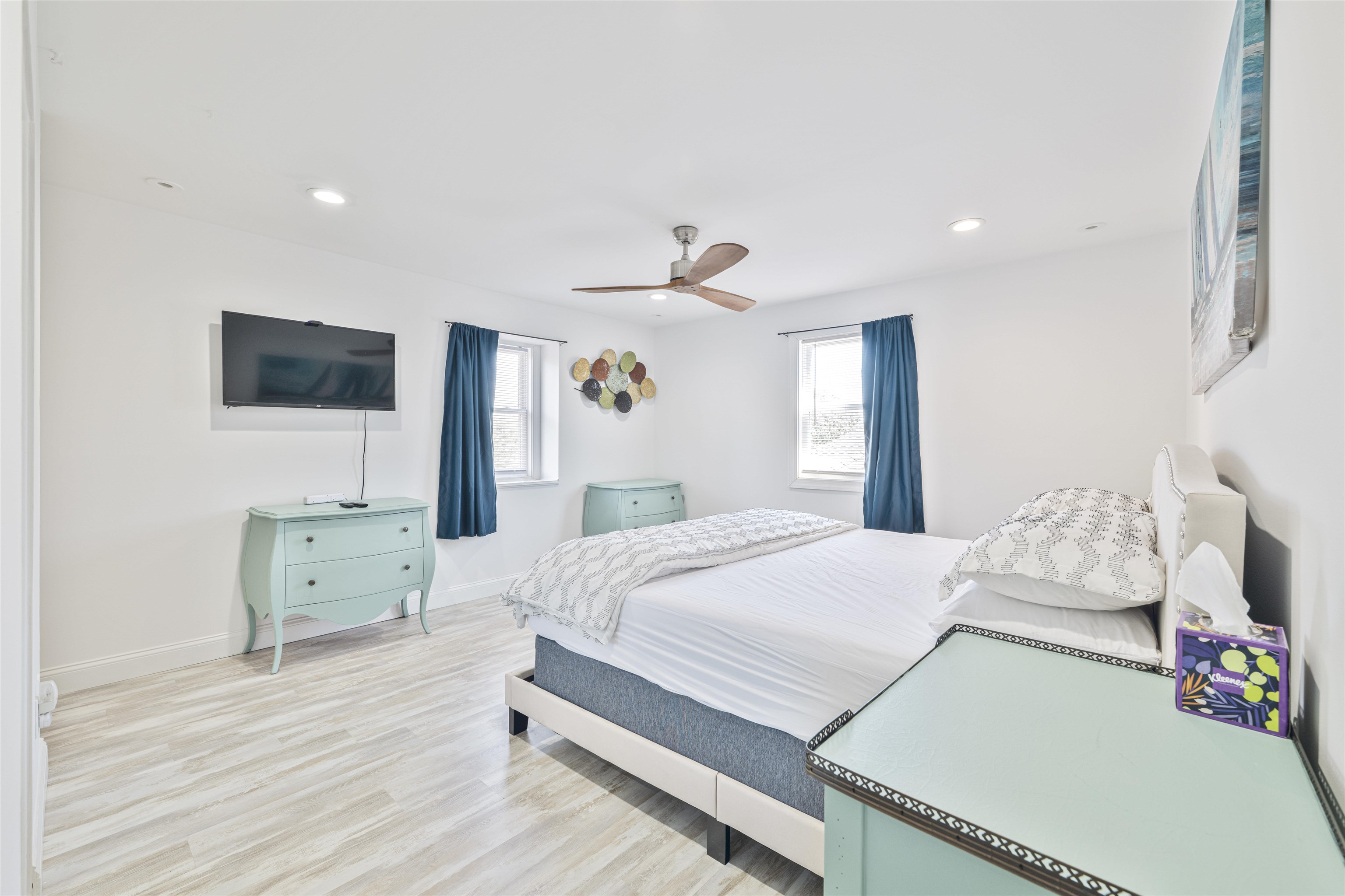 18 Pinewood Road Cape May, NJ 08204 - Photo 26 of 50 a bedroom with a bed and a flat screen tv