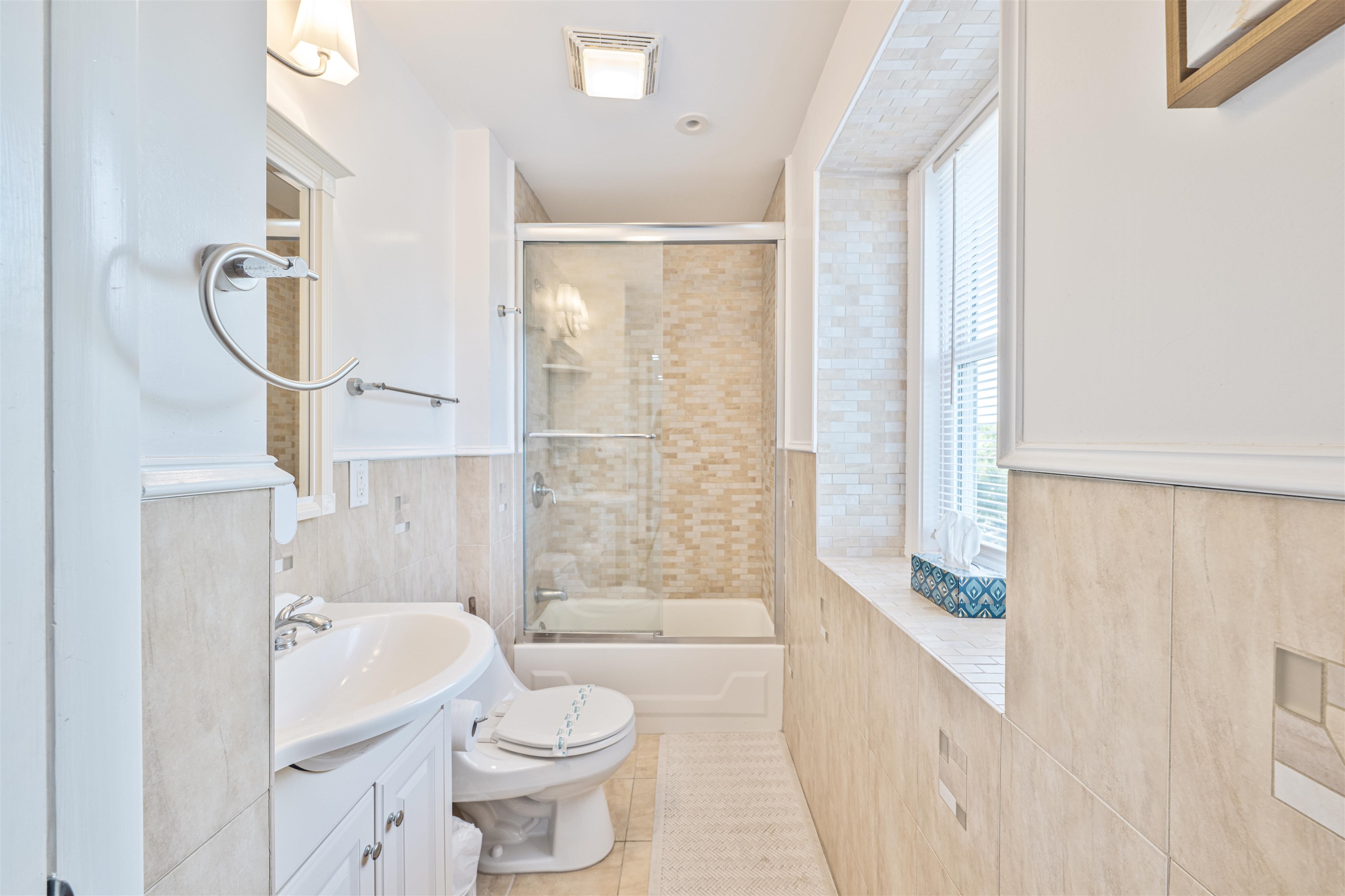 18 Pinewood Road Cape May, NJ 08204 - Photo 29 of 50 a bathroom with a sink a toilet and shower