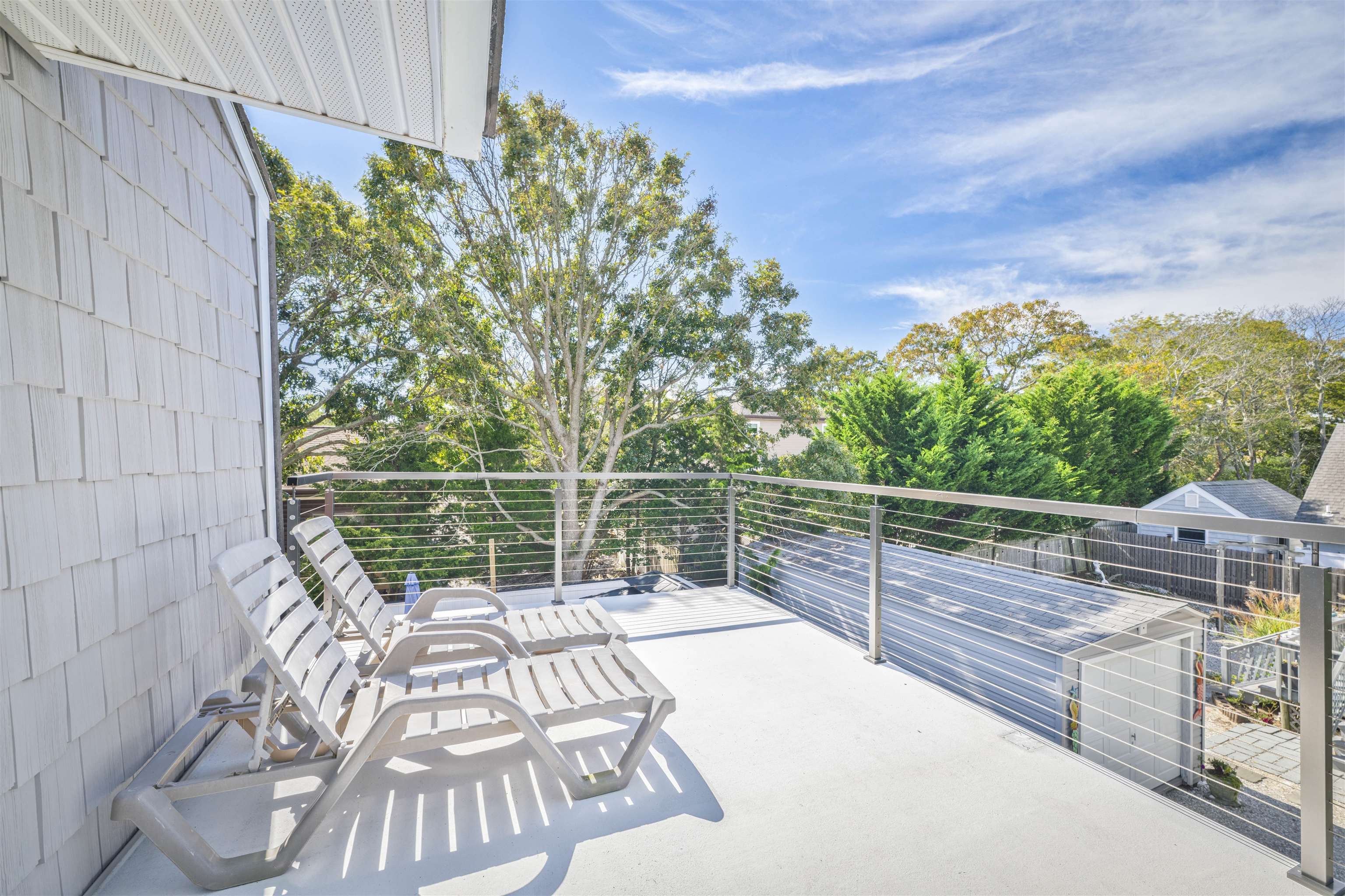 18 Pinewood Road Cape May, NJ 08204 - Photo 36 of 50 a view of a chair and table on the wooden floor