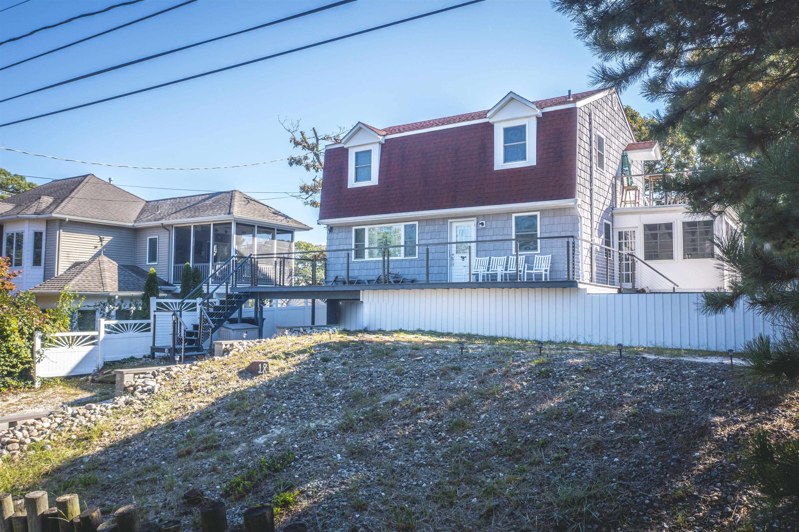 18 Pinewood Road Cape May, NJ 08204 - Photo 5 of 50 a front view of a house with a yard