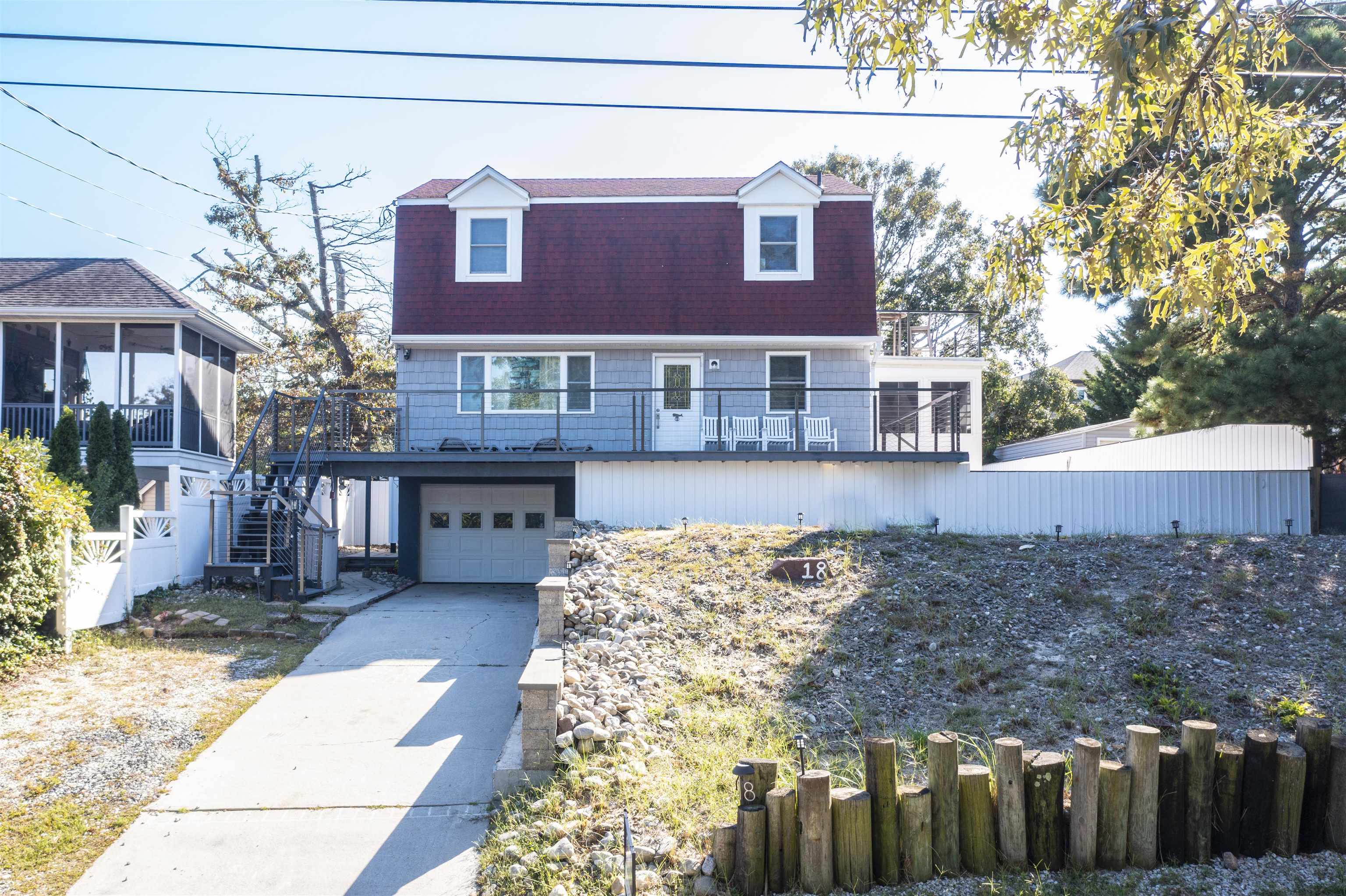 18 Pinewood Road Cape May, NJ 08204 - Photo 7 of 50 a view of a yard in front of house
