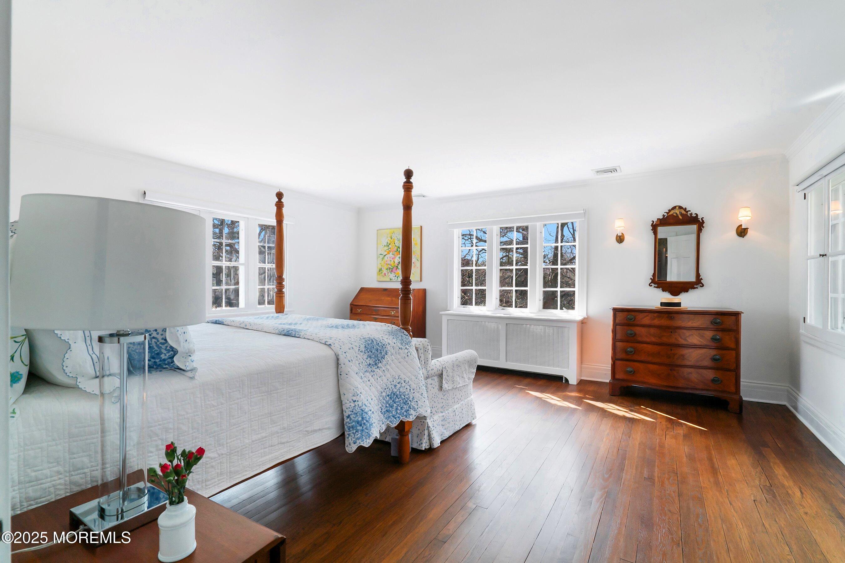 14 Fair Haven Road Rumson, NJ 07760 - Photo 21 of 51 a bedroom with a bed and wooden floor
