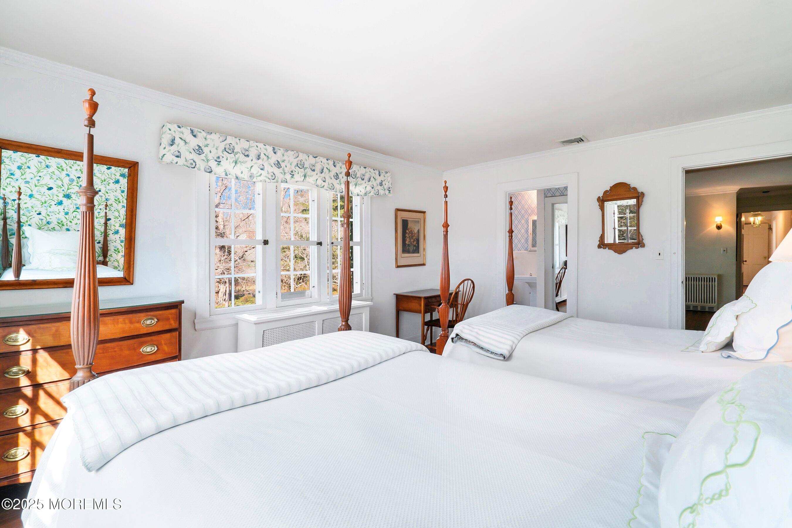 14 Fair Haven Road Rumson, NJ 07760 - Photo 27 of 51 a bedroom with a large bed and a window