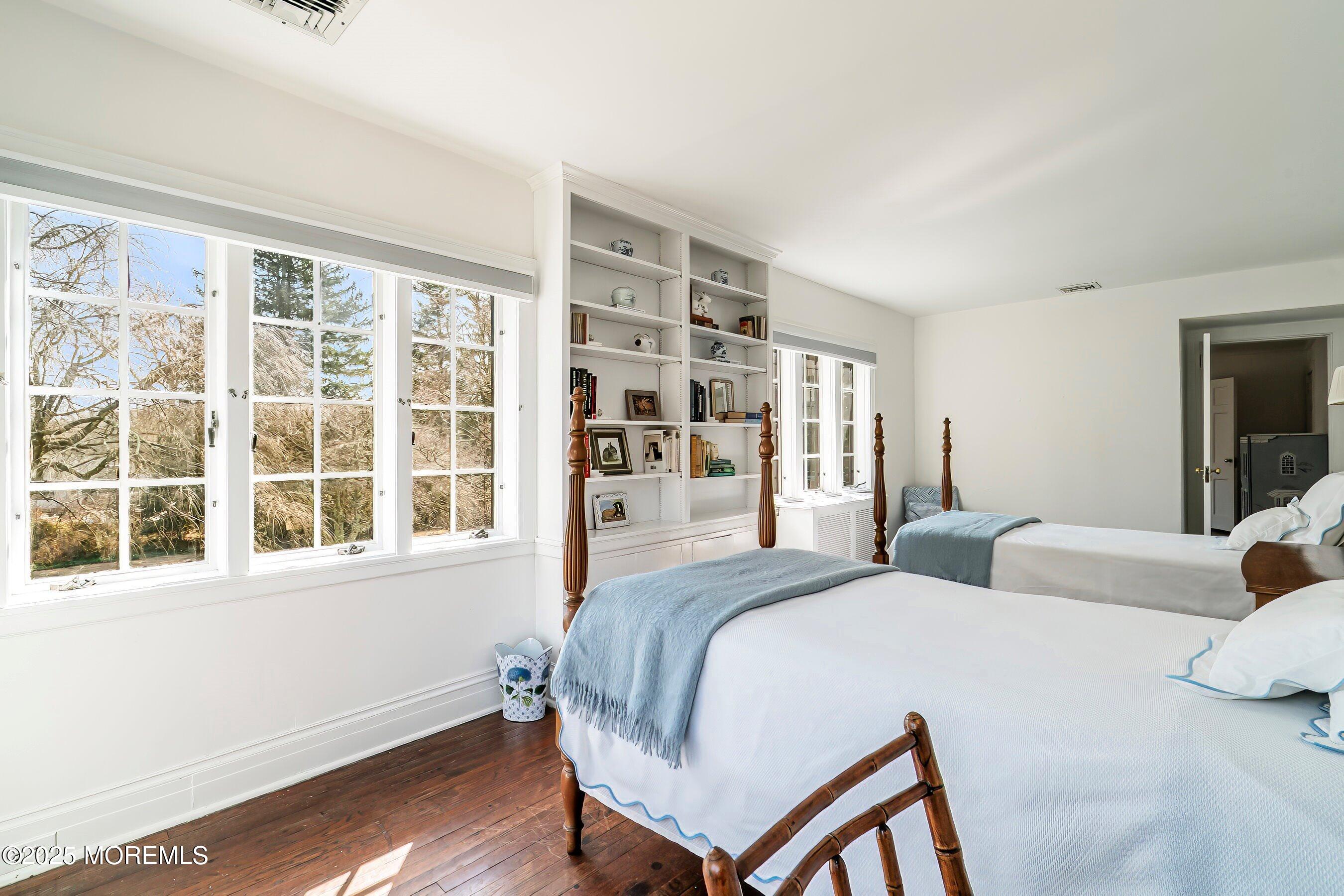 14 Fair Haven Road Rumson, NJ 07760 - Photo 33 of 51 a bedroom with a bed and wooden floor