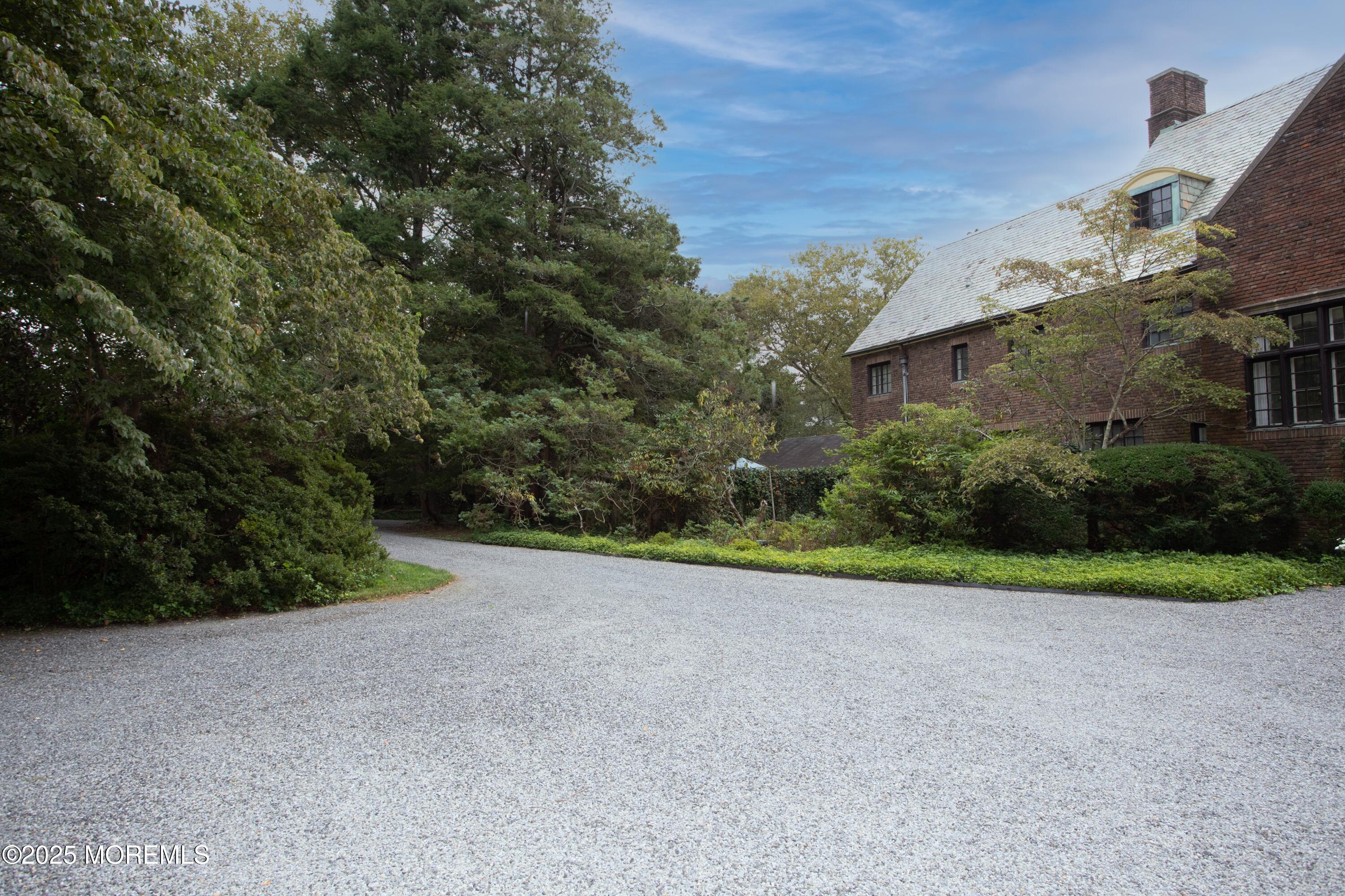 14 Fair Haven Road Rumson, NJ 07760 - Photo 38 of 51 a view of a big yard with plants and large trees