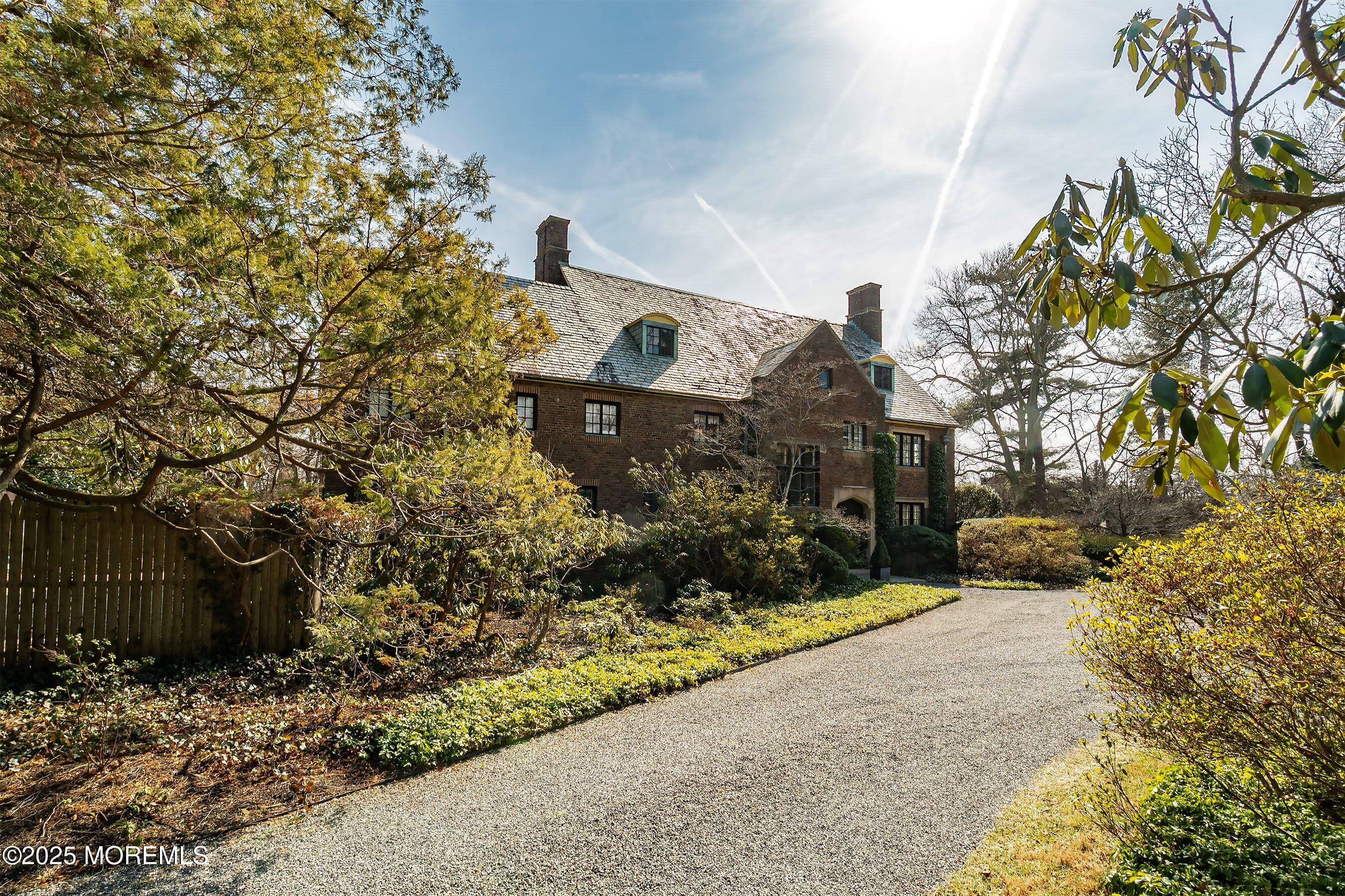 14 Fair Haven Road Rumson, NJ 07760 - Photo 44 of 51 a view of a yard with plants and trees
