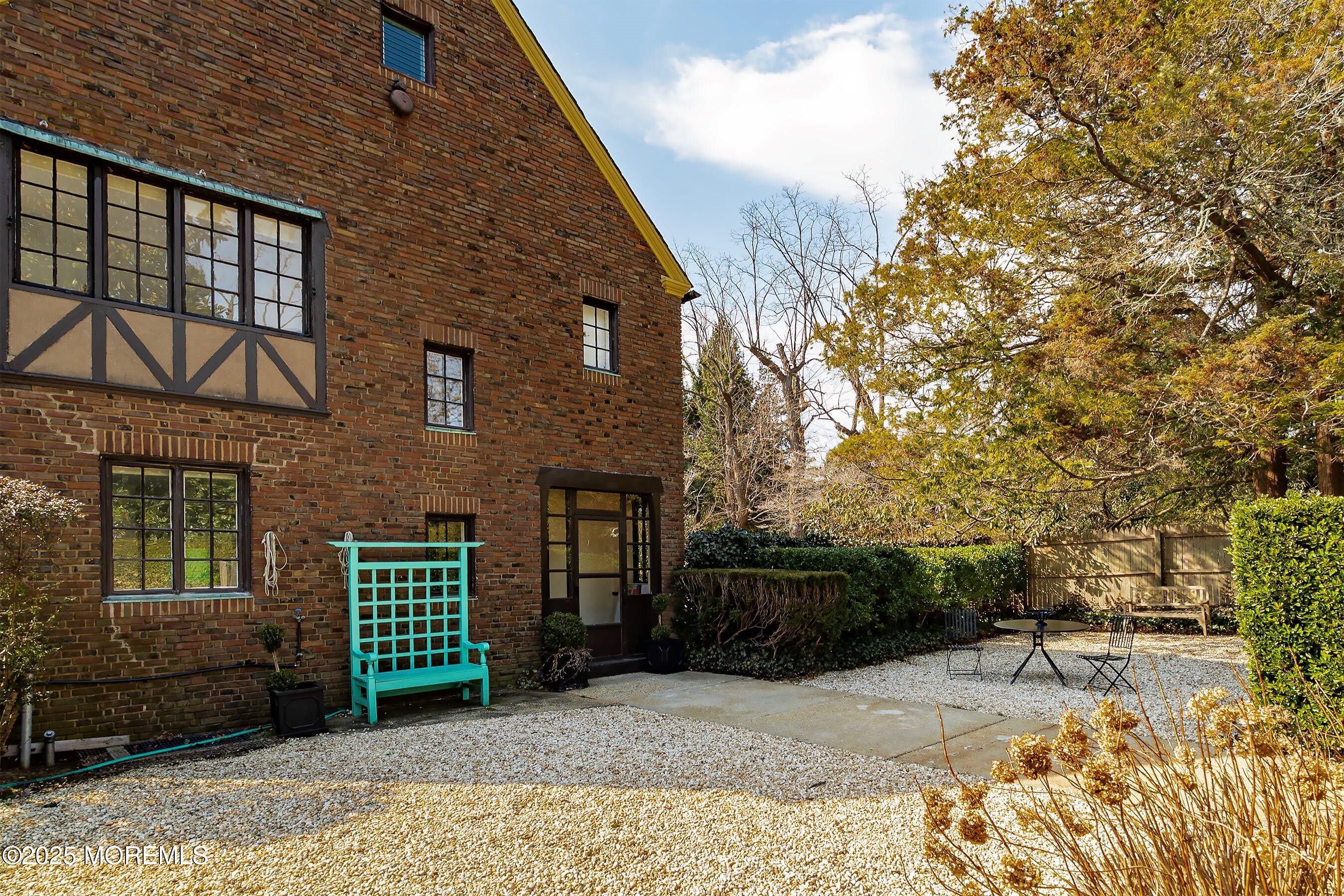 14 Fair Haven Road Rumson, NJ 07760 - Photo 46 of 51 a front view of a house with garden