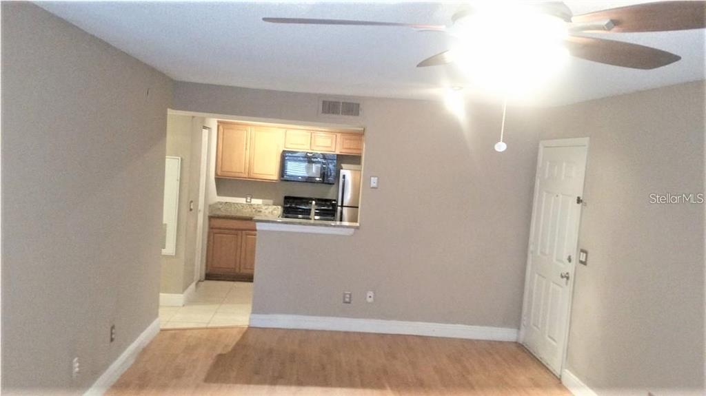 1049 South Hiawassee Road, Unit 3416 Orlando, FL 32835 - Photo 4 of 20 a view of kitchen and utility room