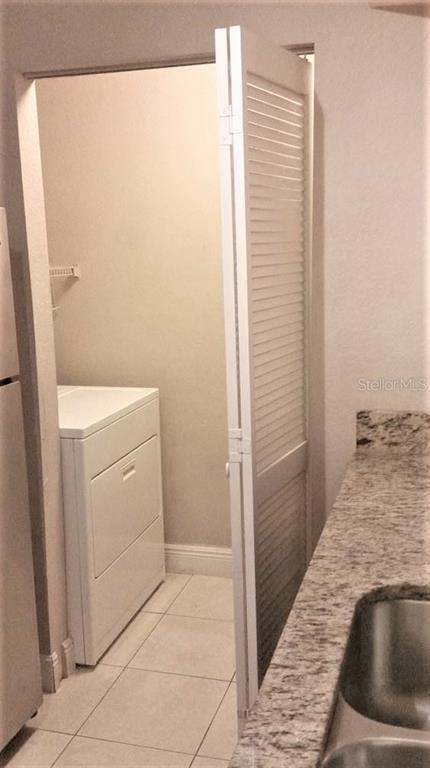 1049 South Hiawassee Road, Unit 3416 Orlando, FL 32835 - Photo 6 of 20 a view of bathroom and utility room