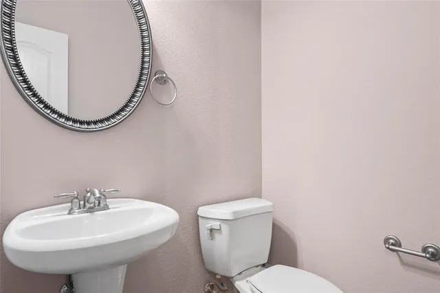 a bathroom with a tub and shower