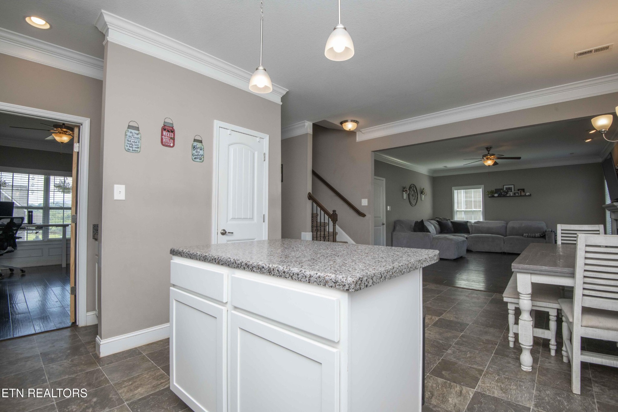 3035 Crosswinds Lane Sevierville, TN 37876 - Photo 11 of 51 a kitchen with a sink dishwasher a stove and a refrigerator with wooden floor