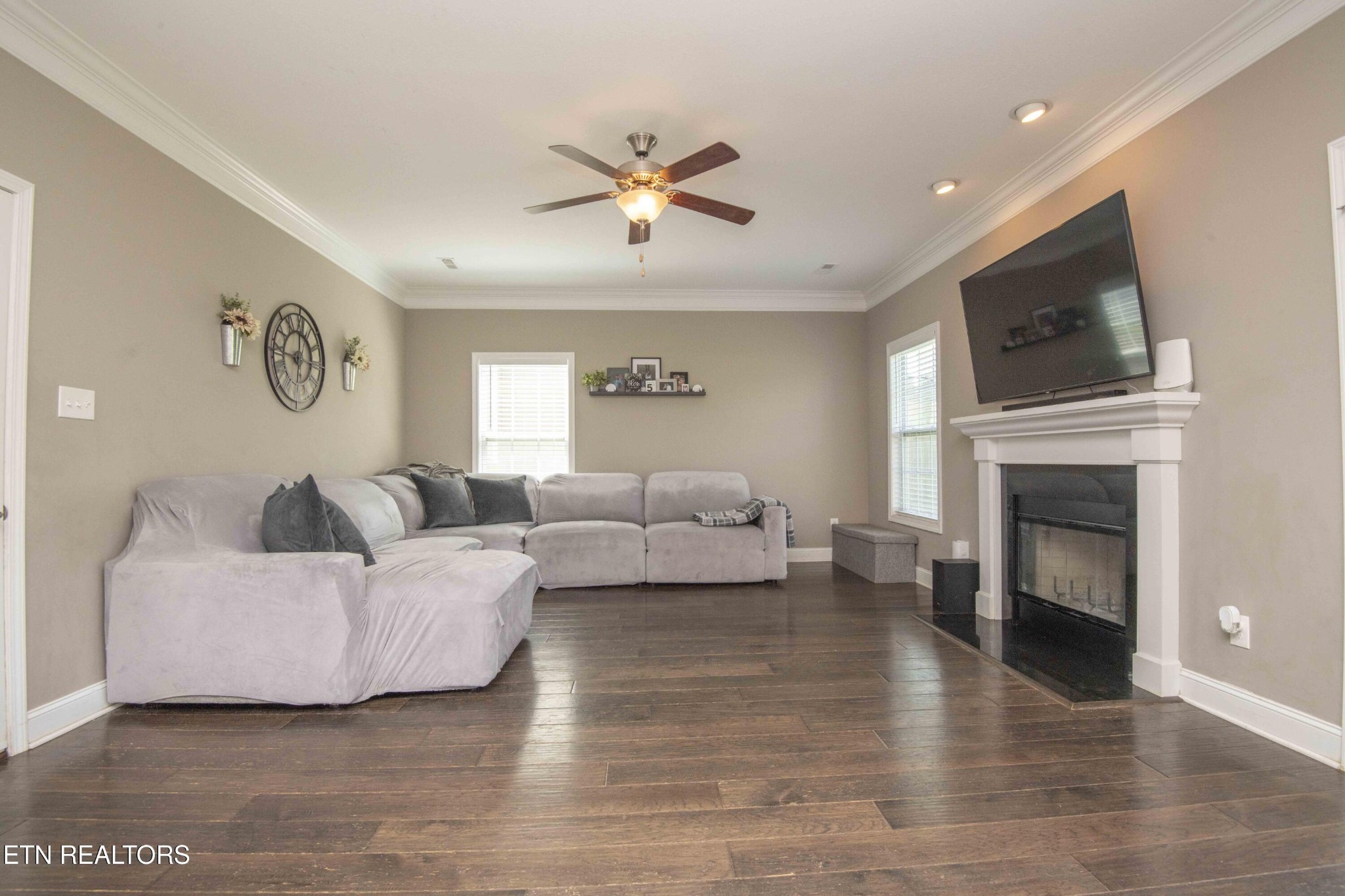 3035 Crosswinds Lane Sevierville, TN 37876 - Photo 17 of 51 a living room with furniture a fireplace and a flat screen tv