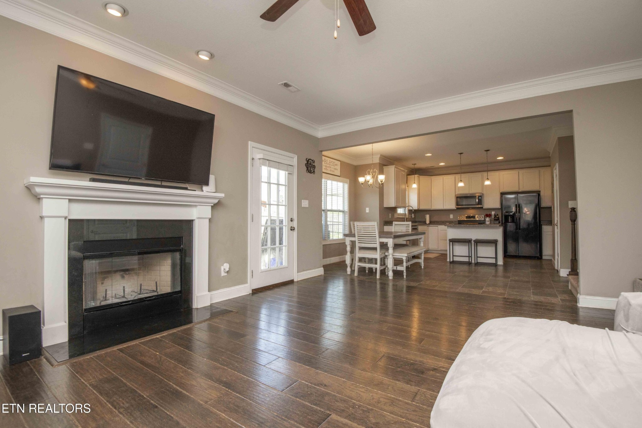 3035 Crosswinds Lane Sevierville, TN 37876 - Photo 21 of 51 a living room with furniture a flat screen tv and a fireplace