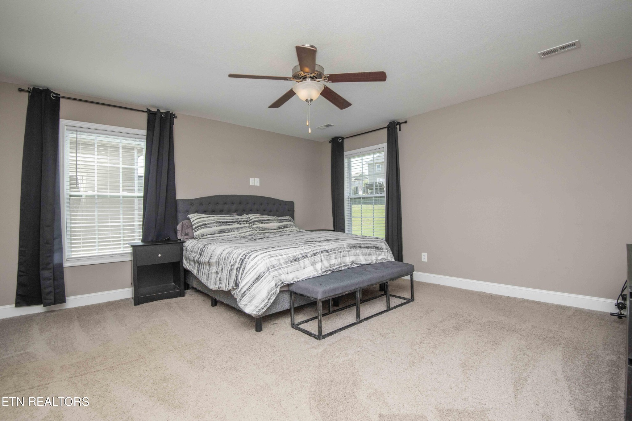 3035 Crosswinds Lane Sevierville, TN 37876 - Photo 23 of 51 a bedroom with a bed and window