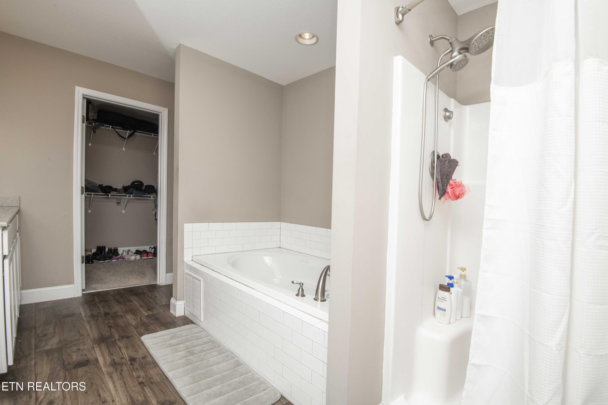 3035 Crosswinds Lane Sevierville, TN 37876 - Photo 28 of 51 a bathroom with a bathtub and a shower