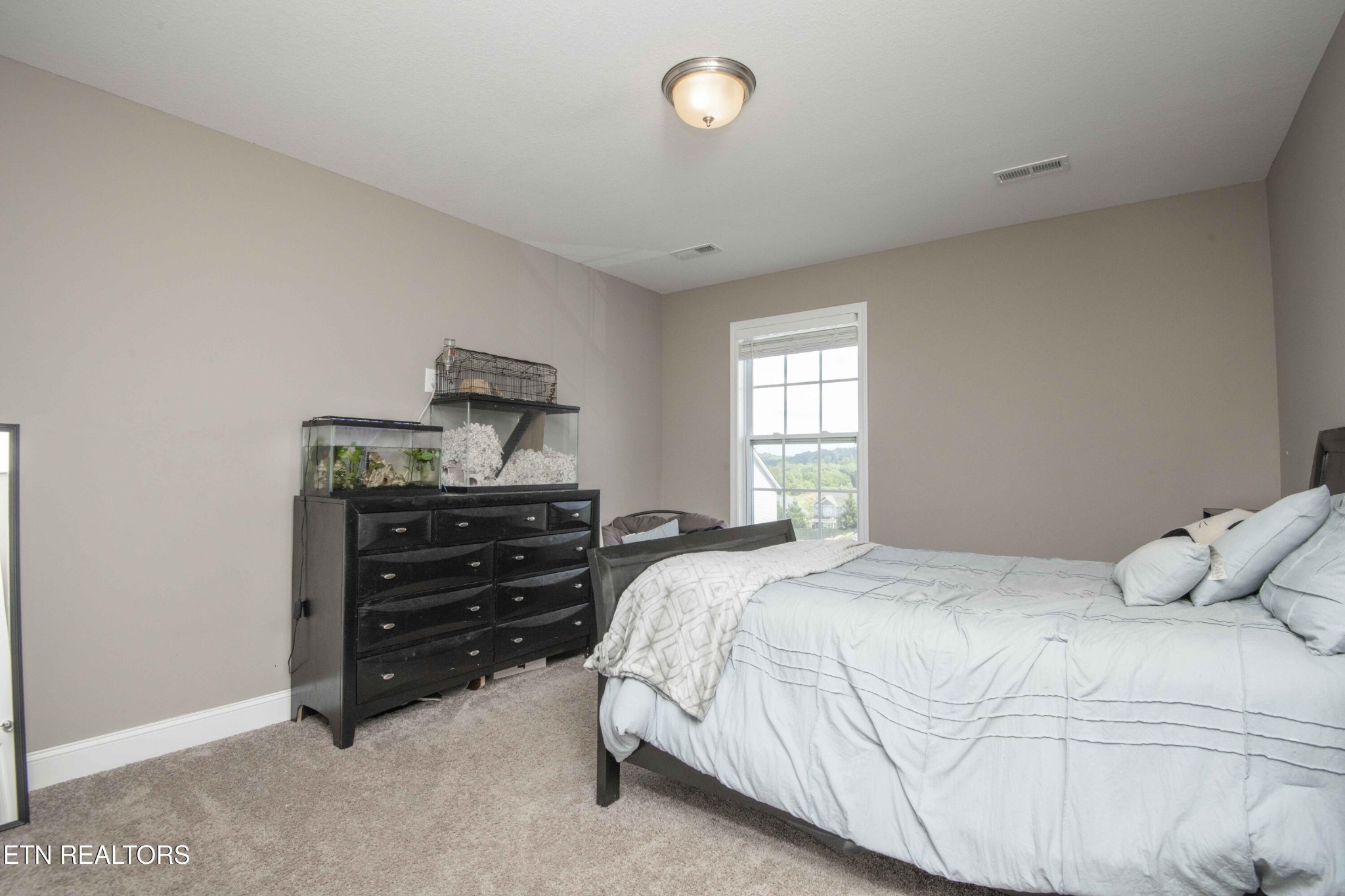 3035 Crosswinds Lane Sevierville, TN 37876 - Photo 32 of 51 a bedroom with a bed and window