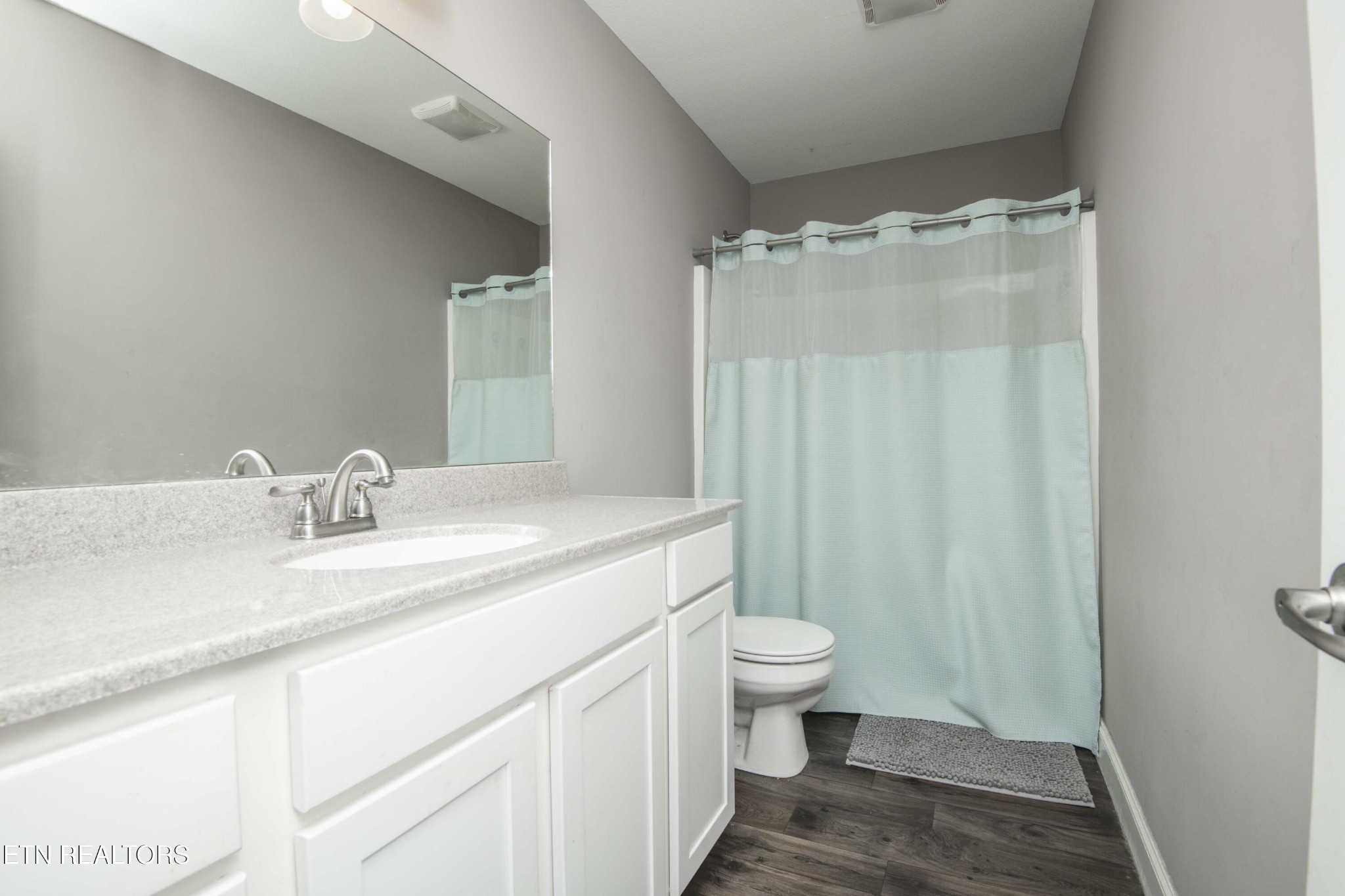 3035 Crosswinds Lane Sevierville, TN 37876 - Photo 33 of 51 a bathroom with a sink and a mirror